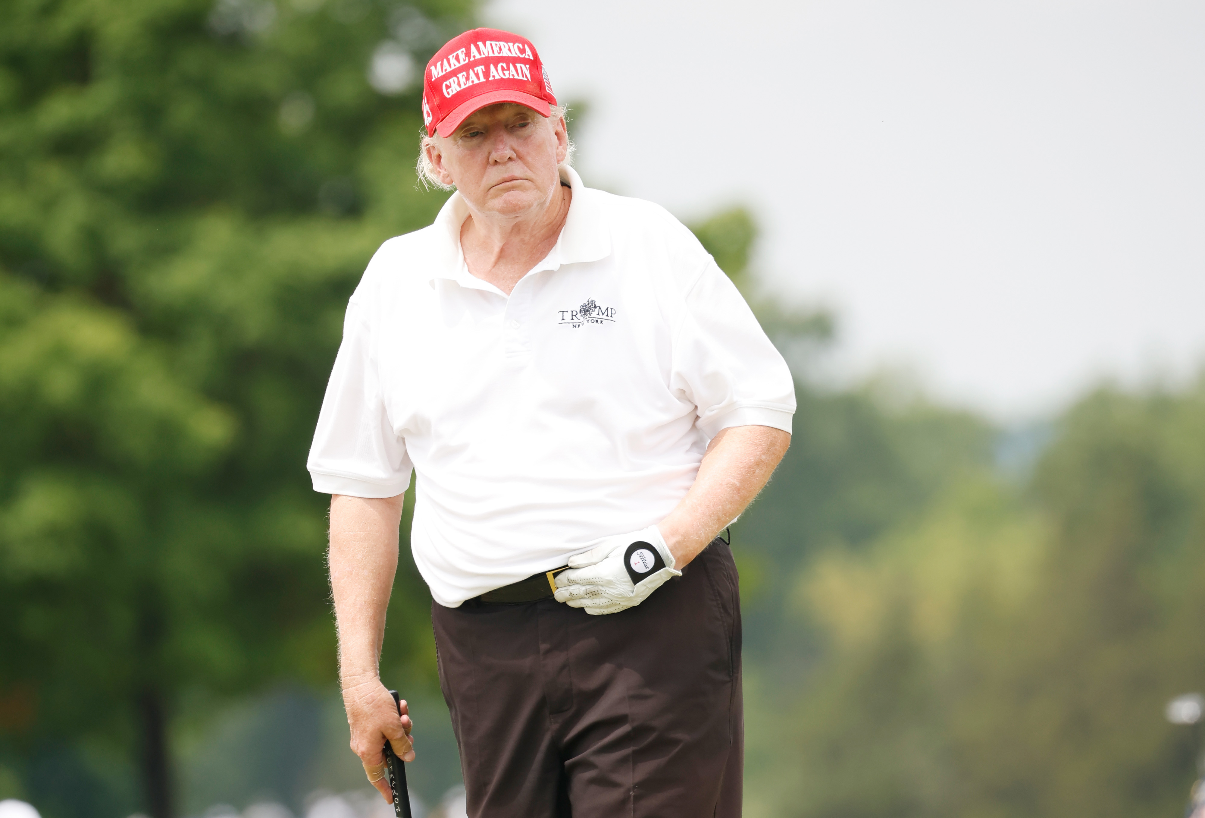 Former U.S. President Donald Trump reacts to a putt on the 15th green during the pro-am prior to the LIV Golf Invitational - Bedminster at Trump National Golf Club Bedminster on July 28, 2022 in Bedminster, New Jersey. (Cliff Hawkins—Getty Images)