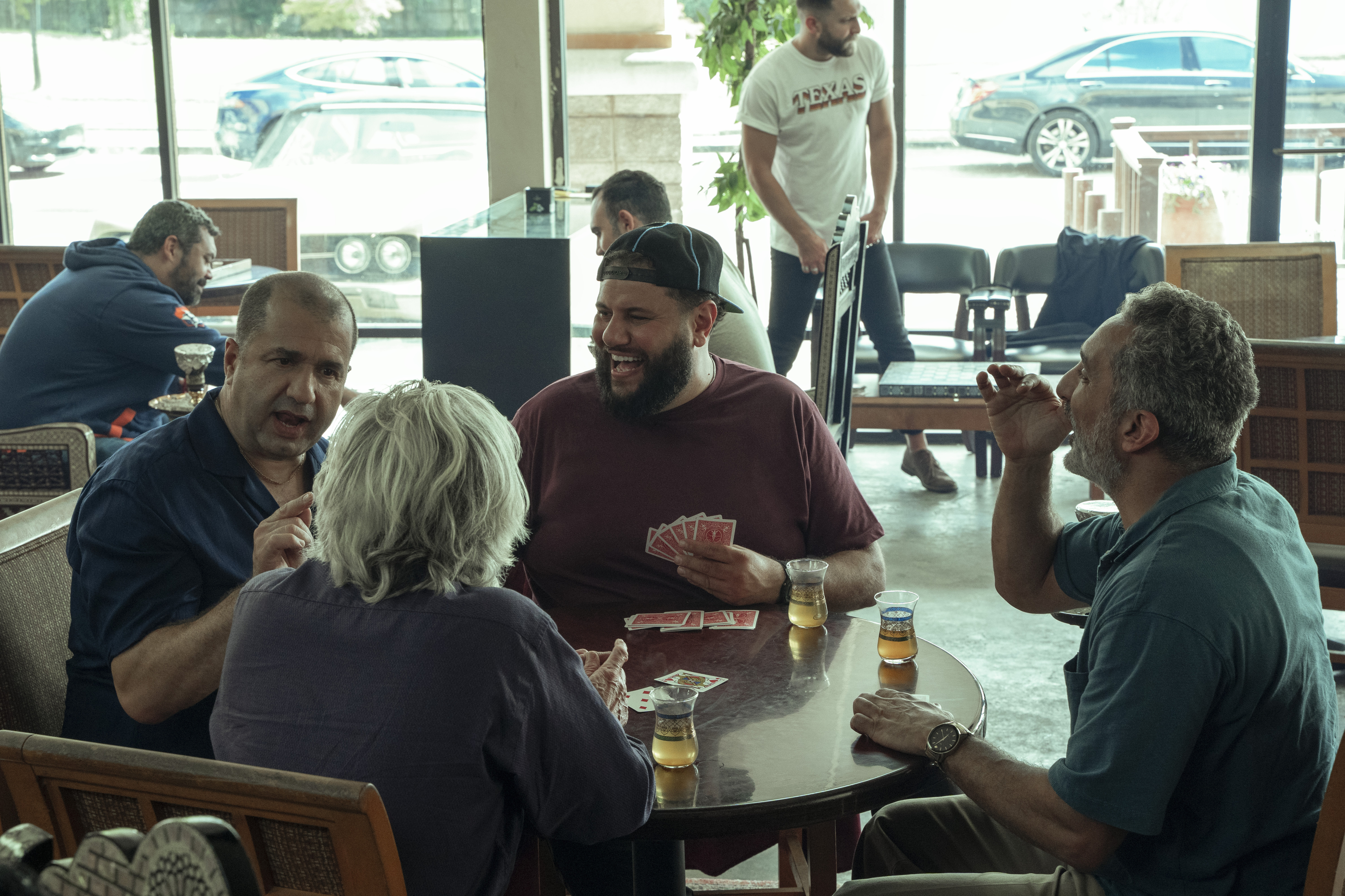 Kamal Zayed as Nazeer, Alan Rosenberg as Aba, Mo Amer as Mo, and Bassem Youssef as Abood in 'Mo' (Rebecca Brenneman—Netflix)