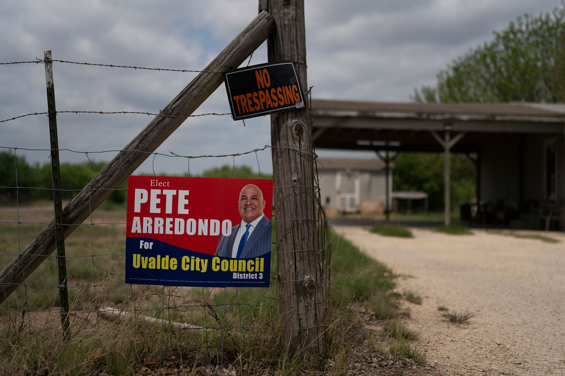 A campaign sign for Pete Arredondo hangs on a fence in Uvalde on May 30. (Jae C. Hong—AP)