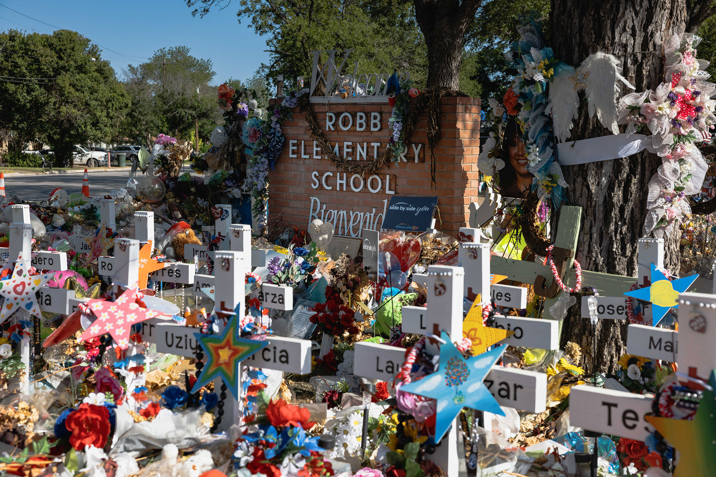 The memorial for the massacre at Robb Elementary School on June 24. (Jordan Vonderhaar—Getty Images)