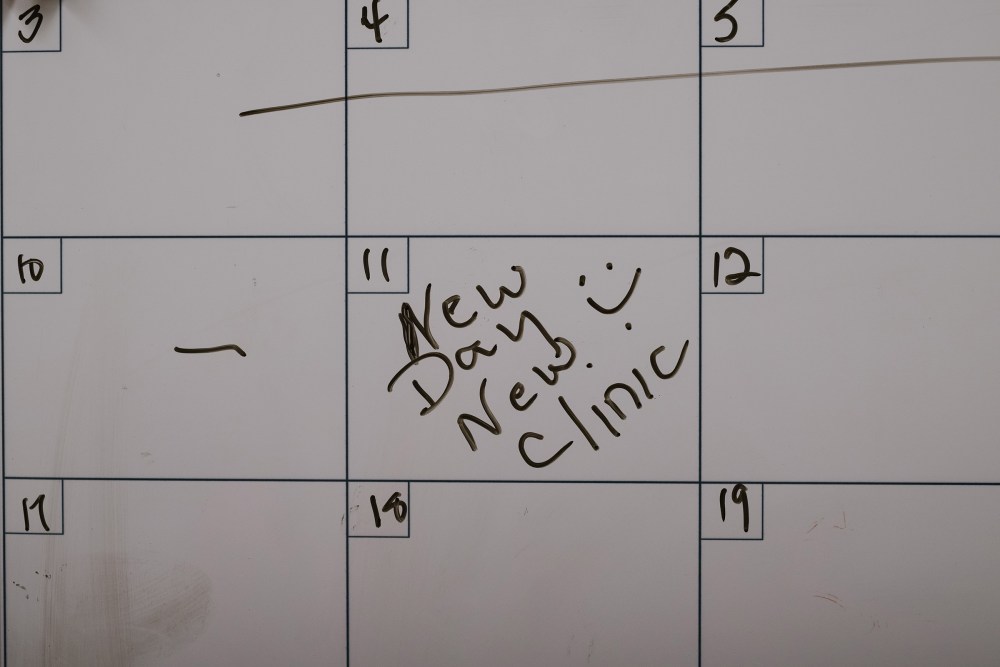  A calendar in the office notes the relaunch of the clinic.