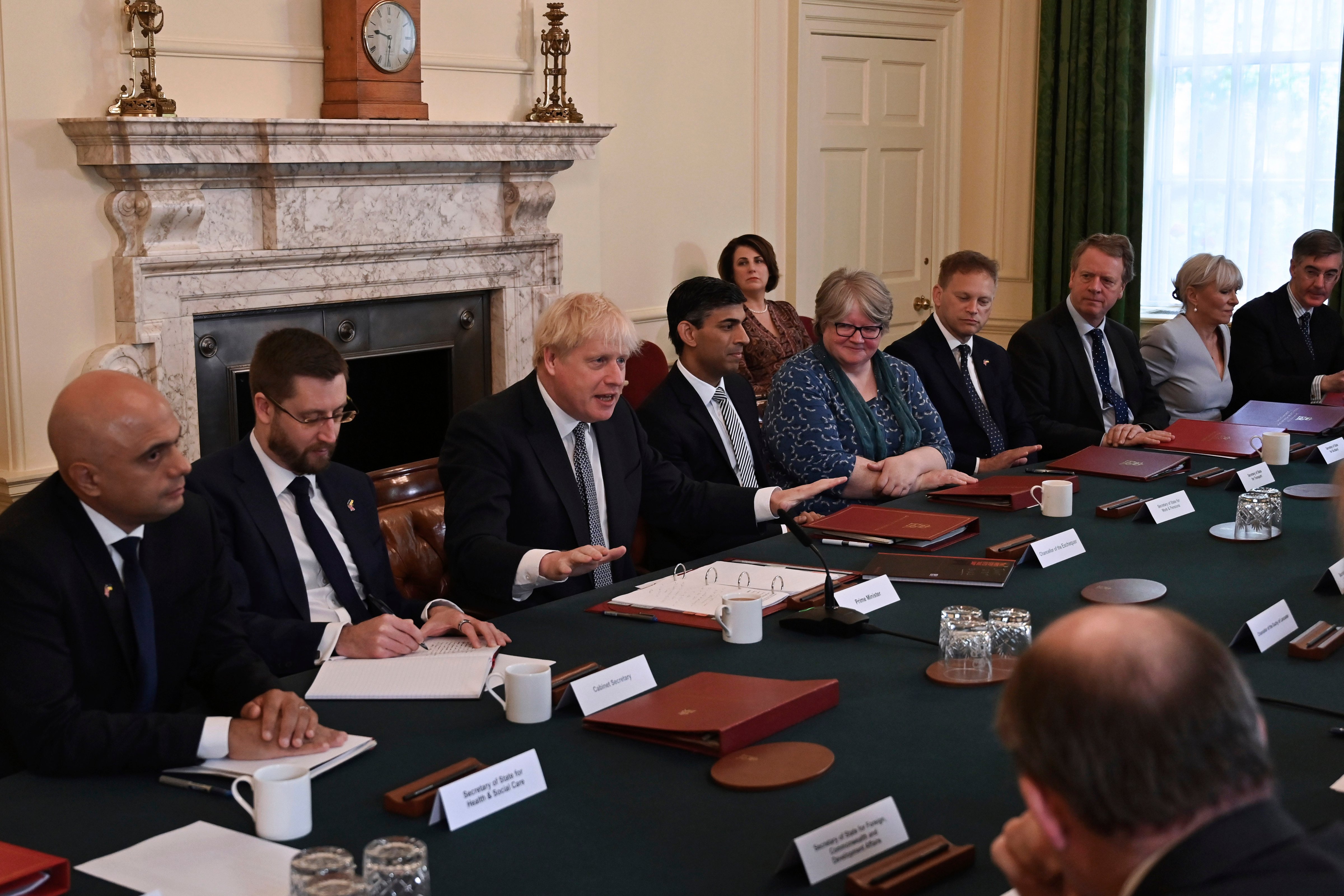 Britain's Prime Minister Boris Johnson, centre, speaks at the start of a cabinet meeting in Downing Street, London on July 5, 2022. (Justin Tallis—Pool/AP)