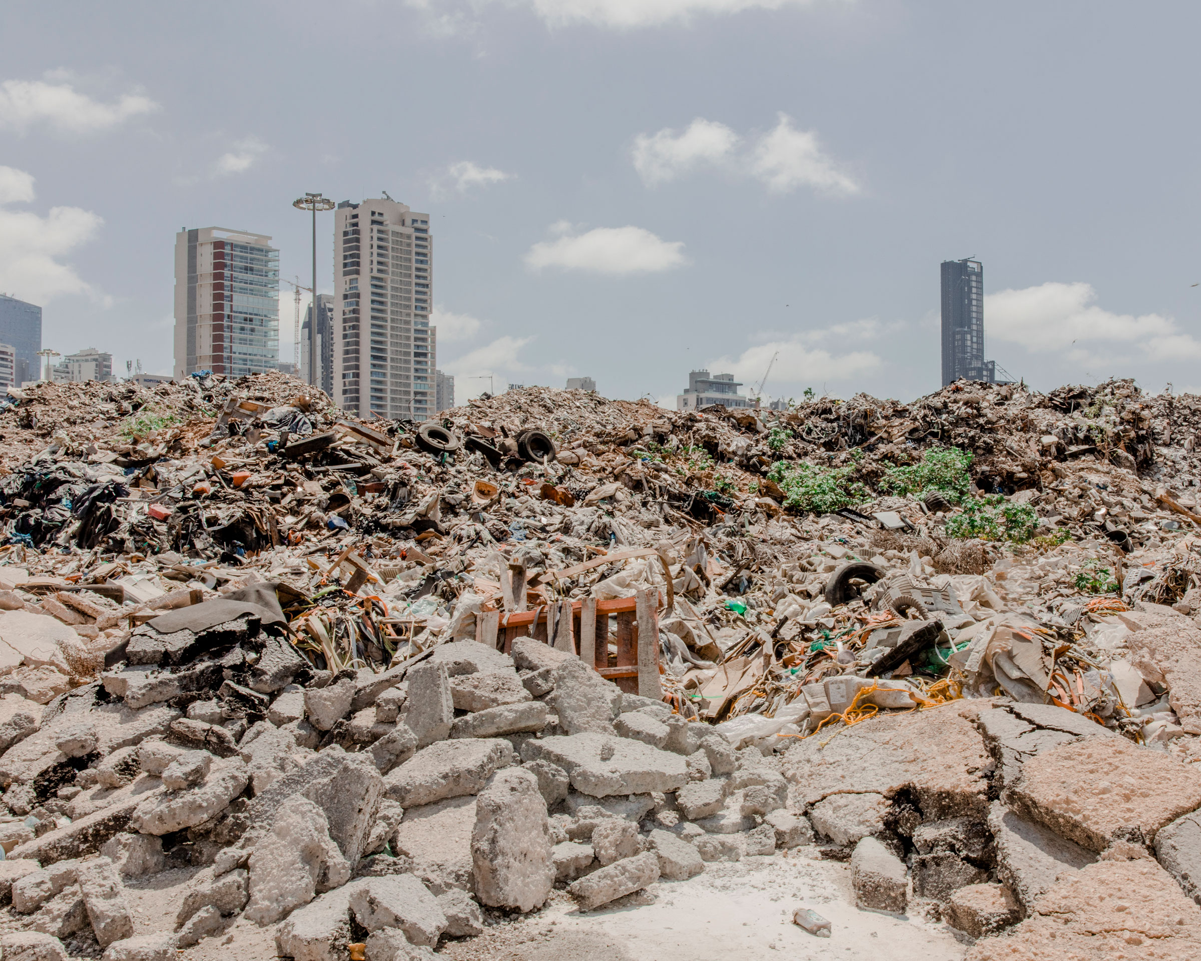 Piles of rubble near the silos at the Beirut port on July 22. (Myriam Boulos—Magnum Photos for TIME)