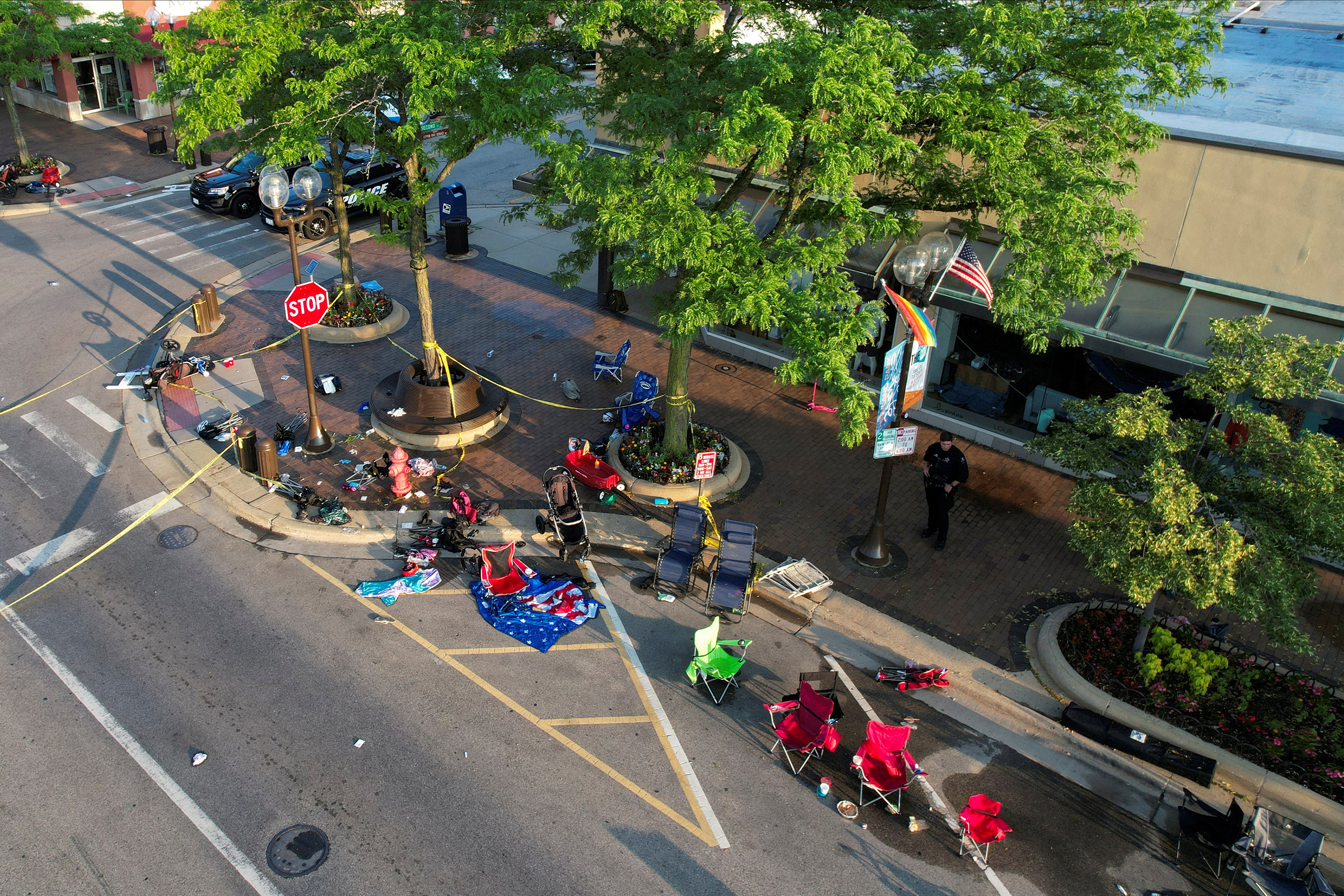 People’s belongings lie abandoned along the parade route after a mass shooting at a Fourth of July parade in the wealthy Chicago suburb of Highland Park, Illinois, U.S. July 5, 2022.