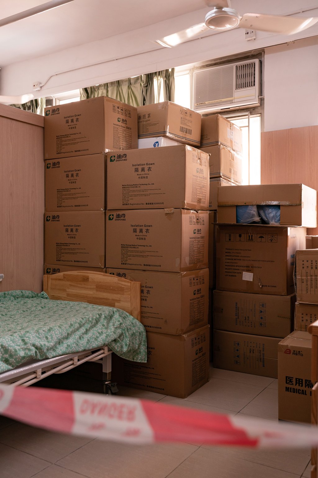 Pandemic supplies are stored in a living cubicle acting as a storage space at Kei Tak (Tai Hang) Home For The Aged.