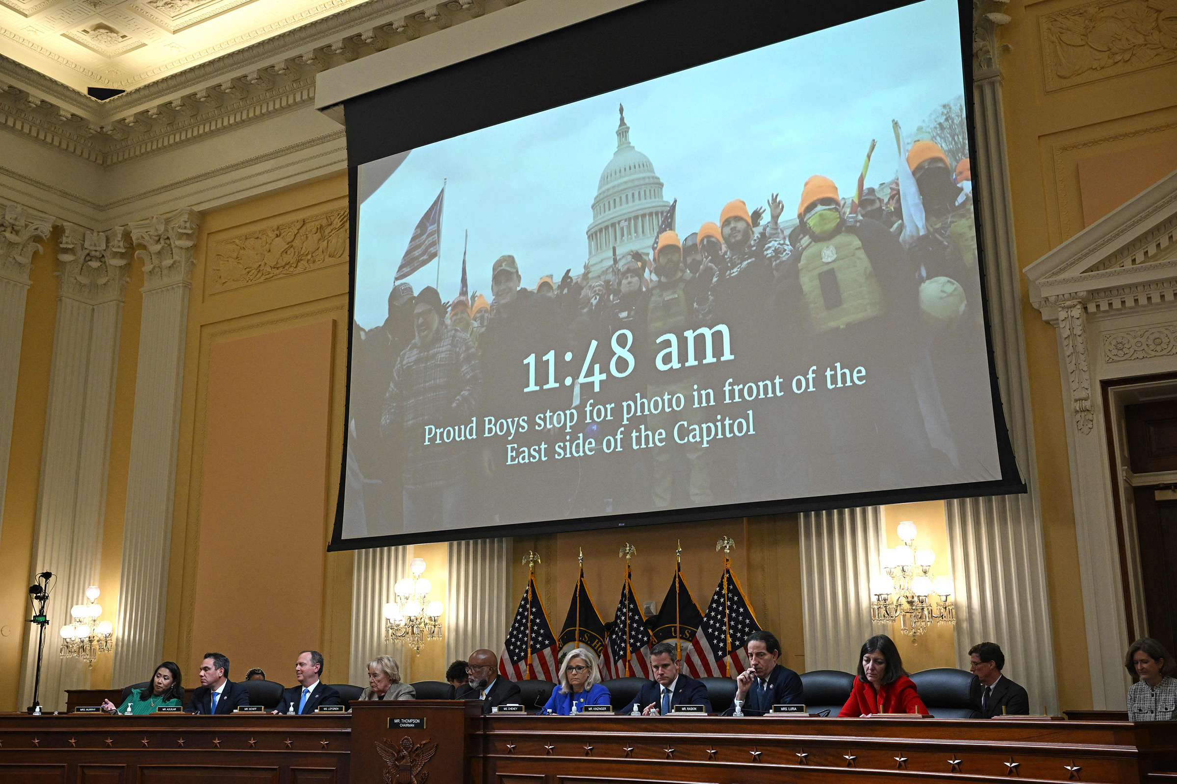 A video showing Proud Boys members appear on screen during a House Select Committee hearing to Investigate the January 6th Attack on the U.S. Capitol, on Capitol Hill in Washington, D.C., on June 9, 2022. (Mandel Ngan—AFP/Getty Images)