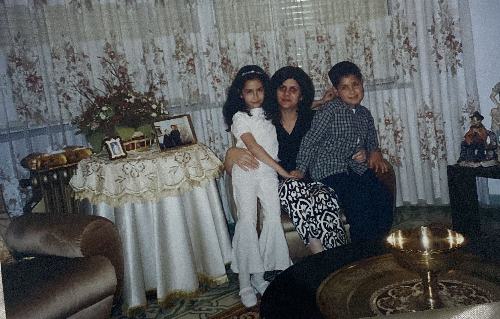 Lina Abu Akleh and her brother pictured with their aunt, Shireen Abu Akleh, as children. (Courtesy of Lina Abu Akleh)