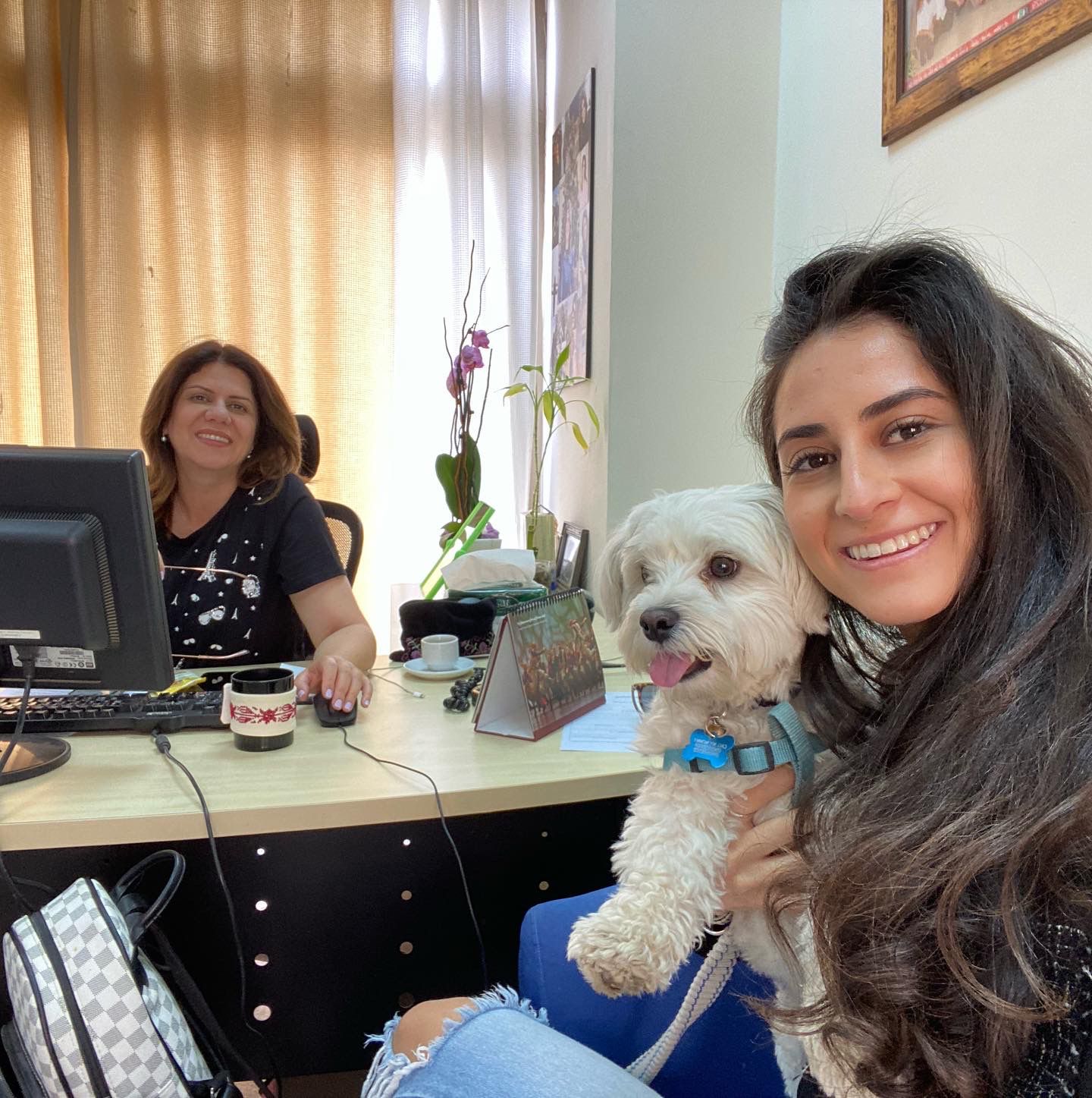 Lina Abu Akleh with her aunt, Shireen, in her office on May 2 (Courtesy of Lina Abu Akleh)