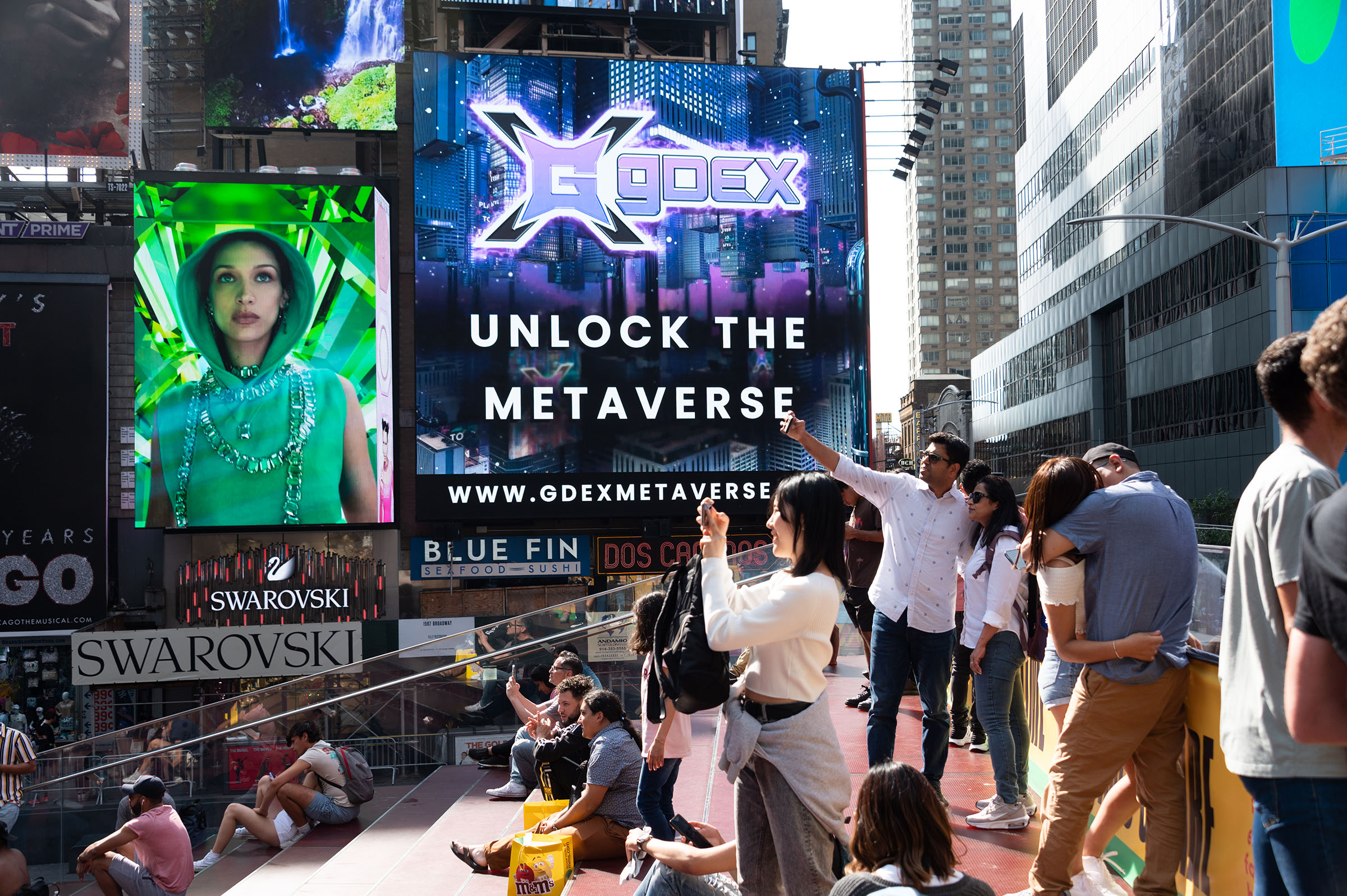 A billboard reads "unlock the metaverse" in Times Square during the 4th annual NFT.NYC conference on June 20, 2022 in New York City. (Noam Galai—Getty Images)