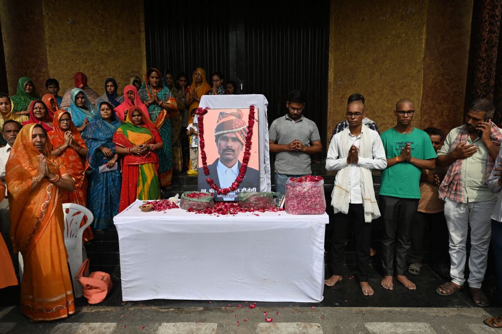 People pay their respects on June 30 to slain Hindu tailor Kanhaiya Lal, who was killed by two Muslim men. (Sajjad Hussain/AFP—Getty Images)