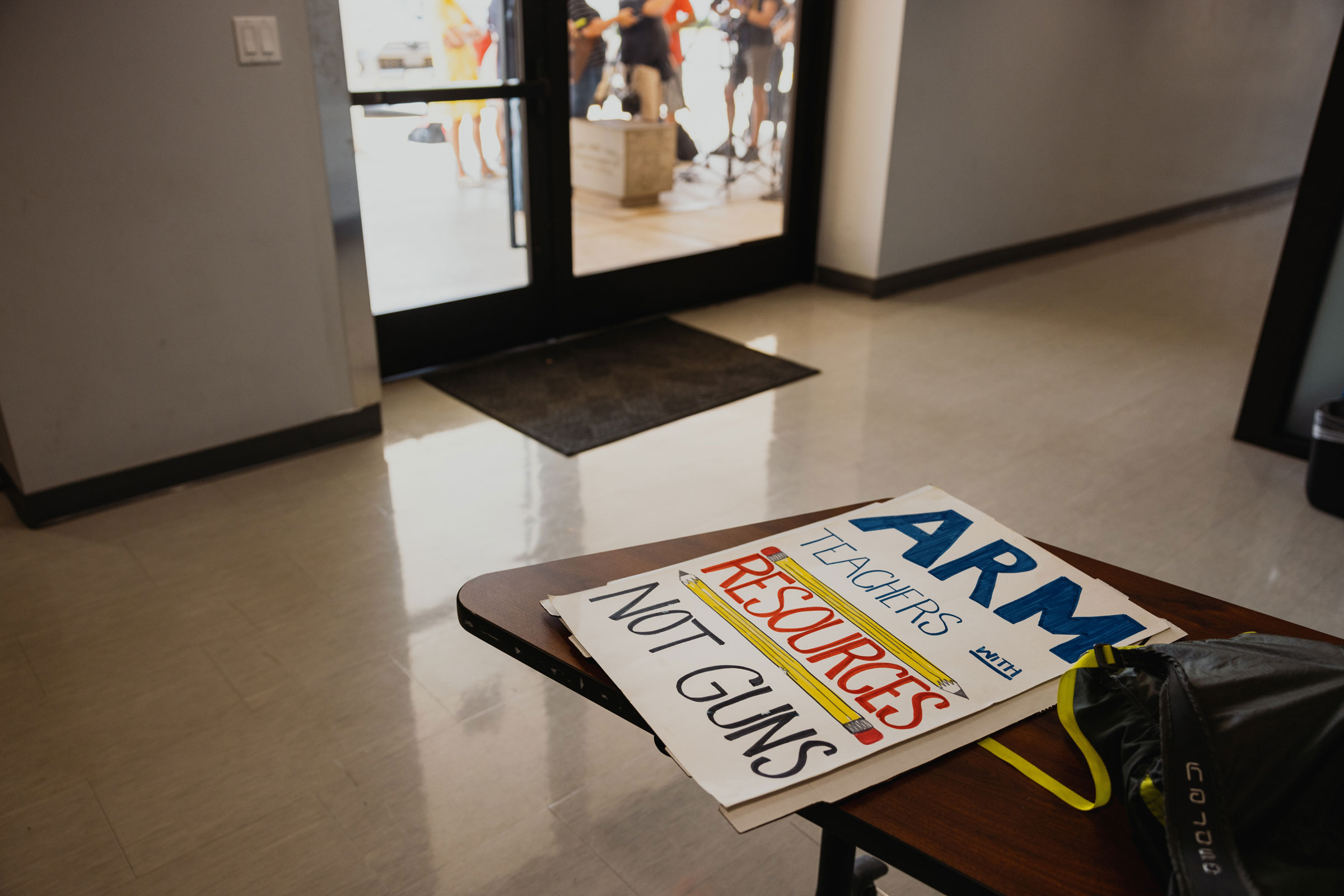 A sign at the AFLCIO office before demonstrators with the Texas American Federation of Teachers prepare to march towards Senator Ted Cruz's office during a 'Take Action: Stop Gun Violence' rally in Austin, Texas, US, on Tuesday, May 31, 2022. (Jordan Vonderhaar—Bloomberg/Getty Images)
