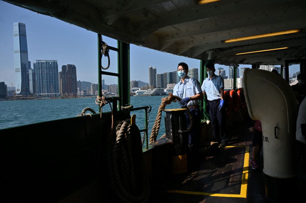 A Star Ferry prepares to dock in Central on Victoria Harbour in Hong Kong on May 4, 2022. The Star Ferry, which traces its origins back to the 1880s, has struggled financially to keep afloat after tourist arrivals in the southern Chinese city plummeted (PETER PARKS/AFP via Getty Images)