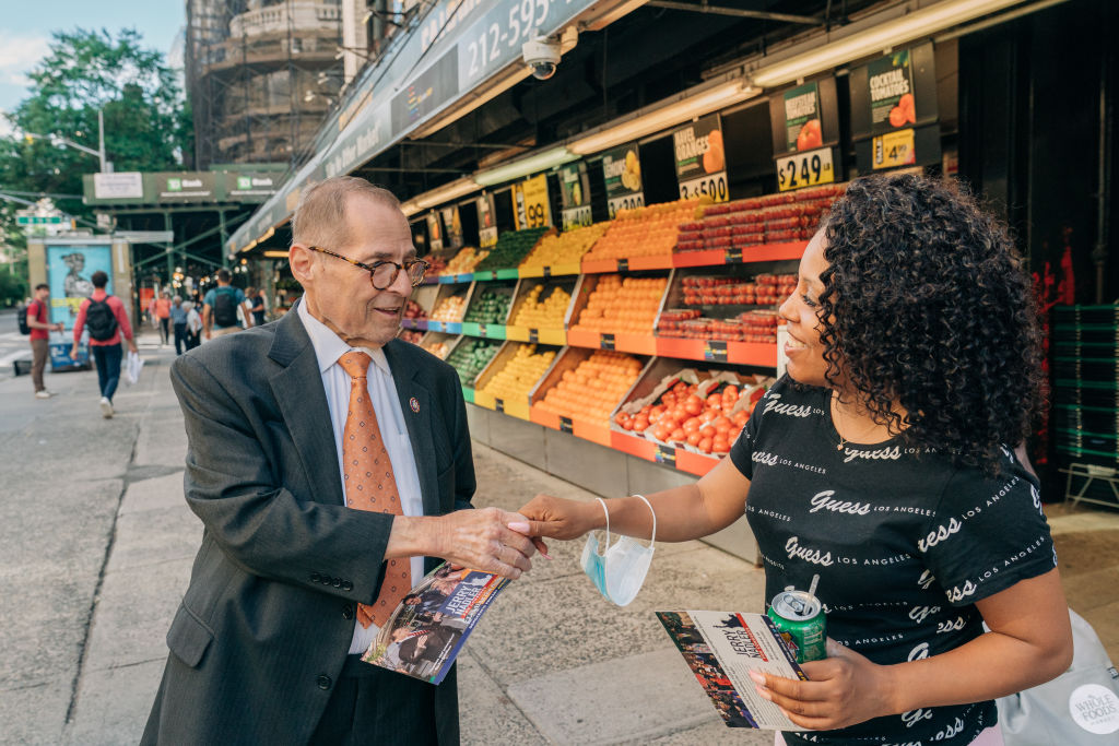 Rep. Jerry Nadler, who is running for re-election in a tight Democratic primary, greets a voter during a campaign stop outside a market in New York on June 28, 2022. (Jeenah Moon—The Washington Post via Getty Images)