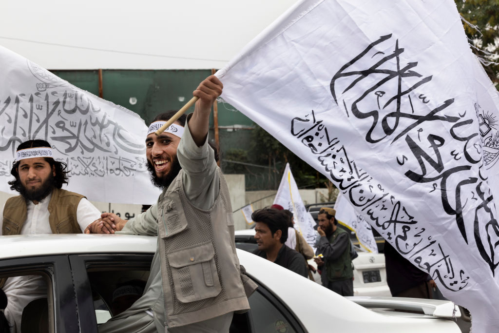 Taliban take to the streets during a national holiday celebrating the first anniversary of the Taliban takeover on August 15, 2022 in Kabul, Afghanistan. (Paula Bronstein /Getty Images)