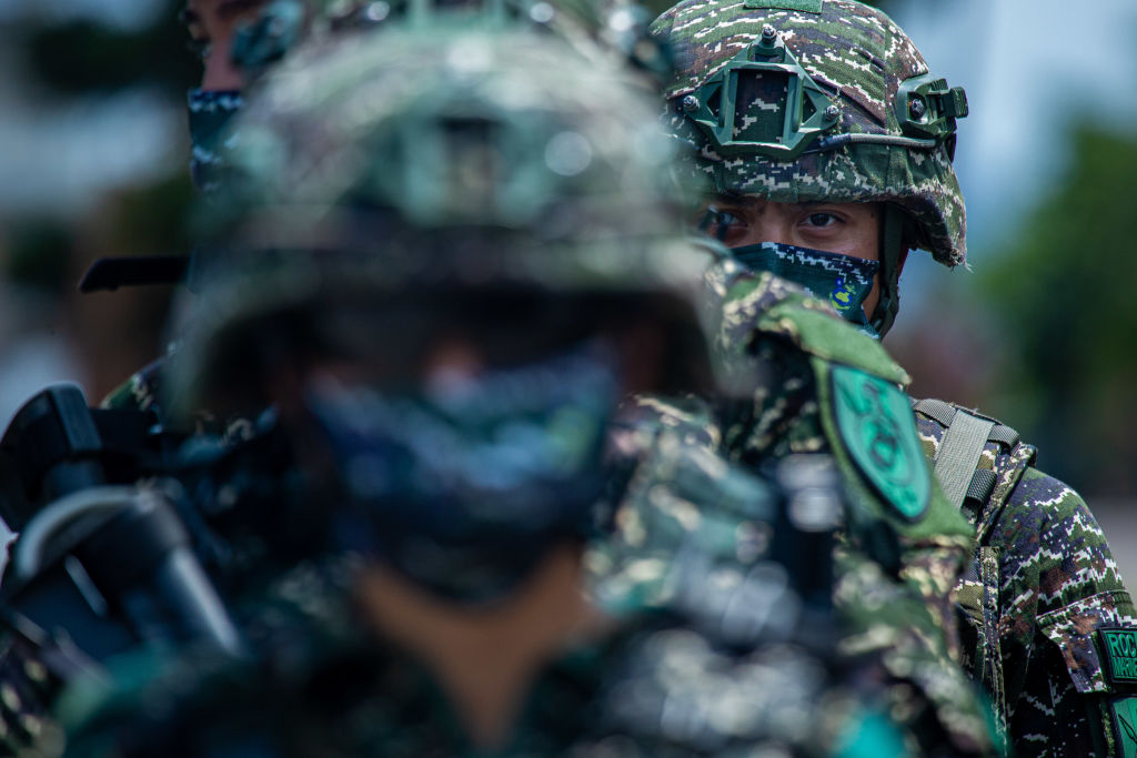 Taiwanese military personnel stand by during a military exercise that simulates a mainland Chinese invasion of the island, July 27, 2022, New Taipei City, Taiwan. (Annabelle Chih/Getty Images)
