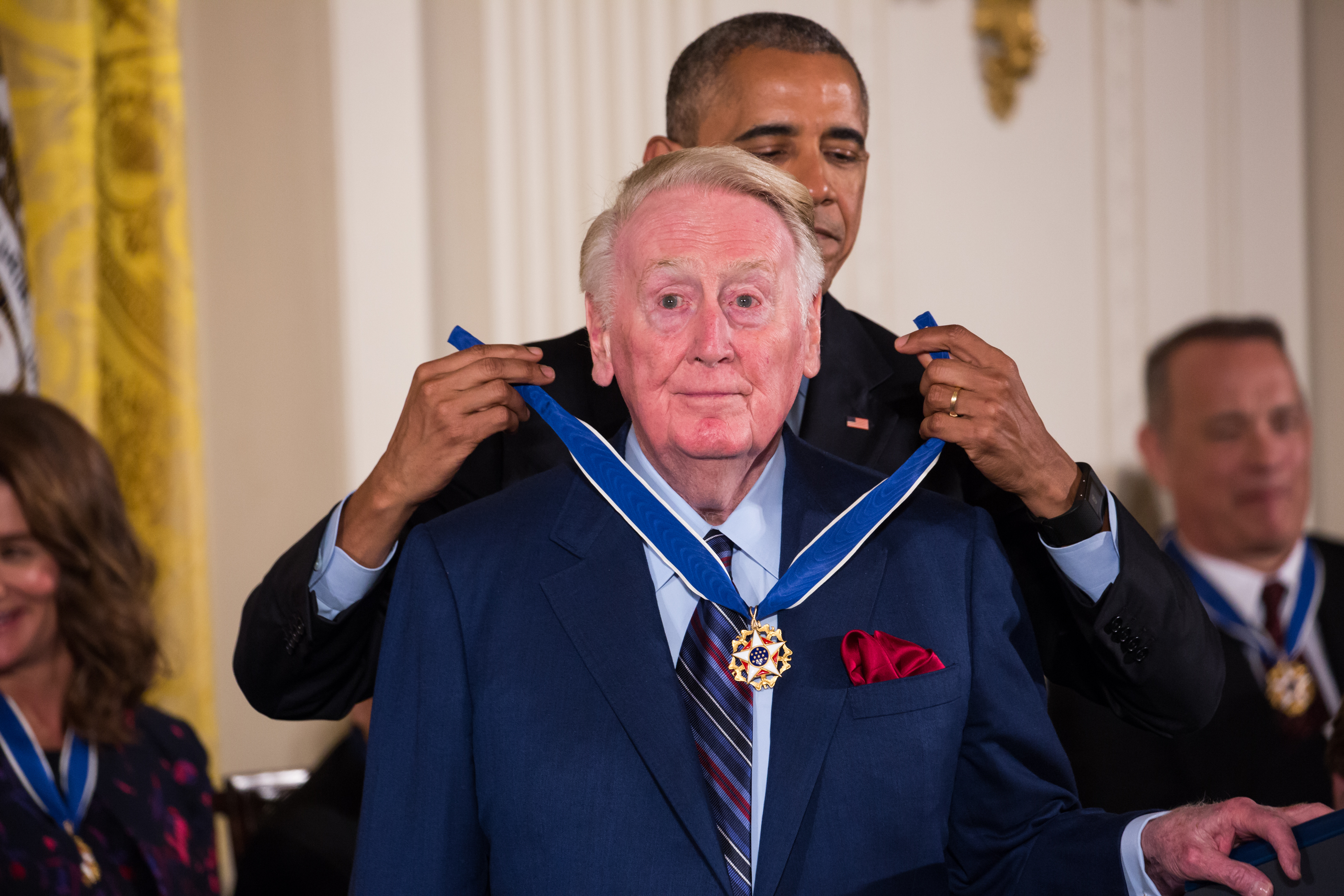 Vin Scully, the legendary Los Angeles Dodgers sportscaster who passed away, on Aug. 2, at 94, receives the Presidential Medal of Freedom from President Barack Obama in 2016. (Photo by Cheriss May/NurPhoto via Getty Images)