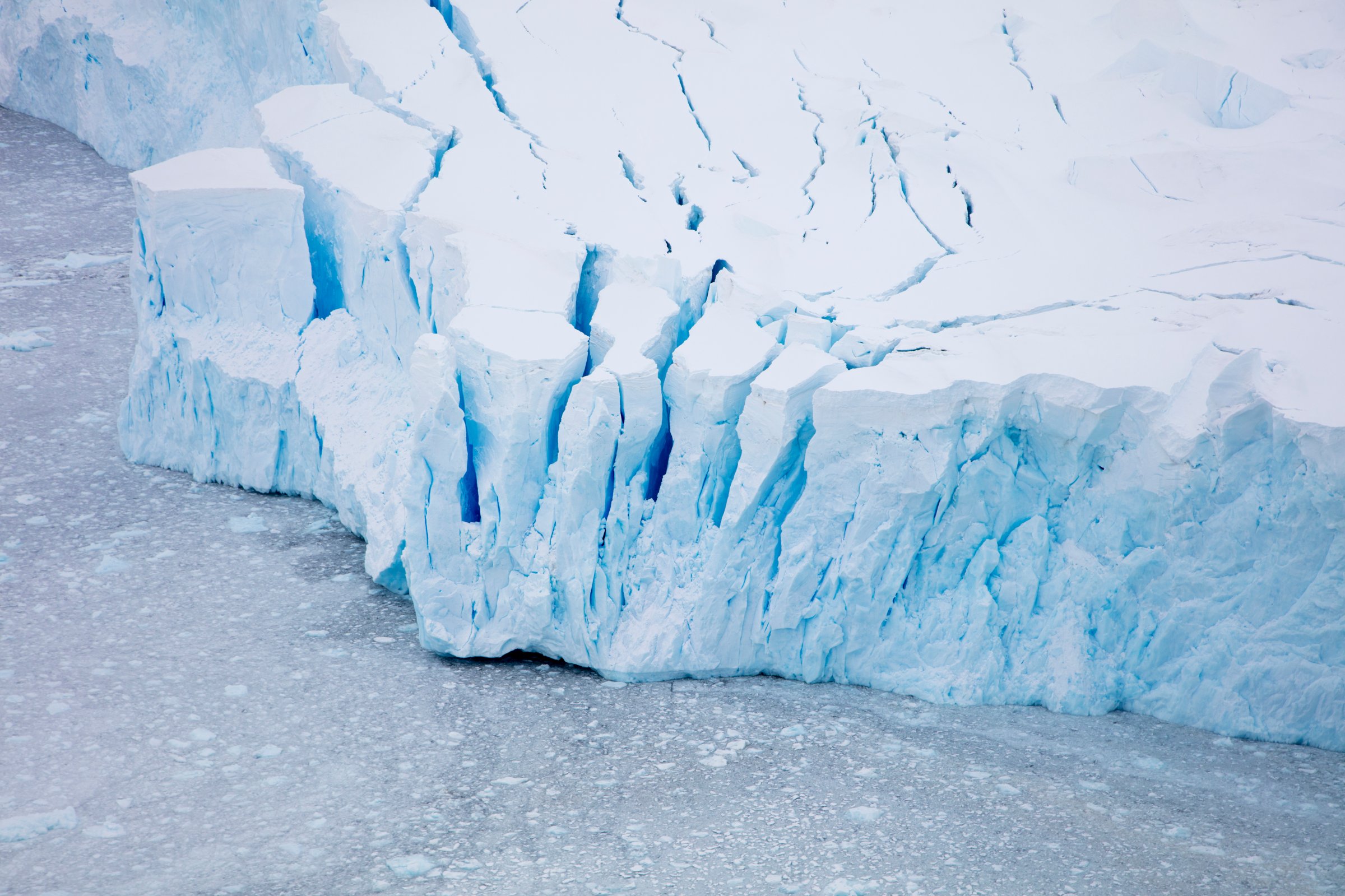 Overhead of glacier shelf with blue ice