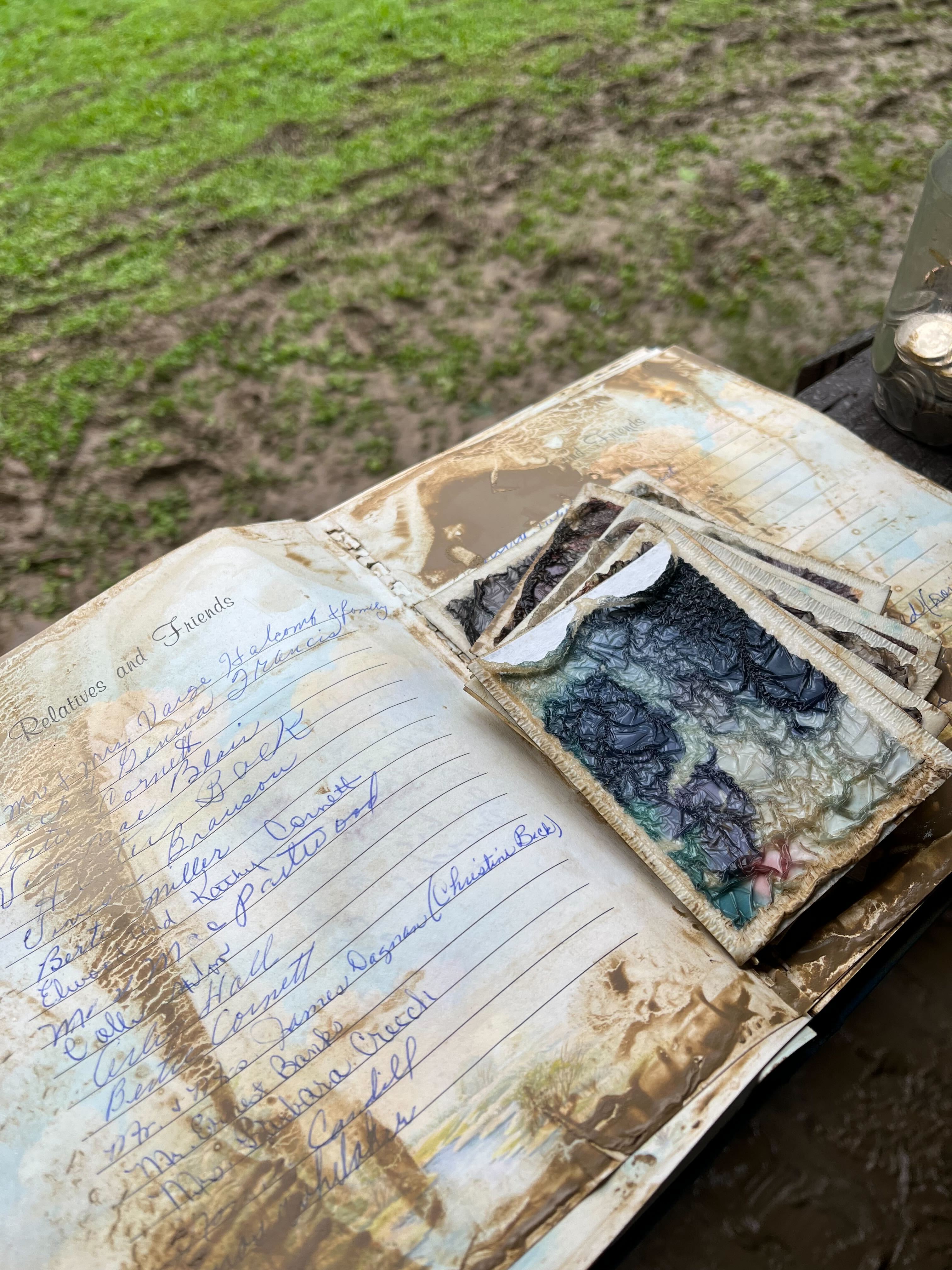 Many Appalachians cherish a "family bible," a book recording details about the family lineage going back generations. Bolen's family dries out theirs after it was ruined by the flood, Knott County, Kentucky, July 29, 2022. (Shared by Lakyn Bolen)