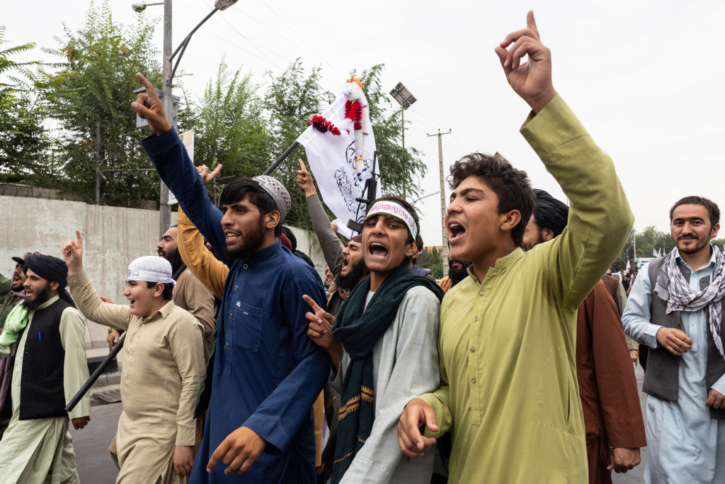 Taliban take to the streets during a national holiday celebrating the first anniversary of the Taliban takeover on August 15, 2022 in Kabul, Afghanistan. (Paula Bronstein/Getty Images)