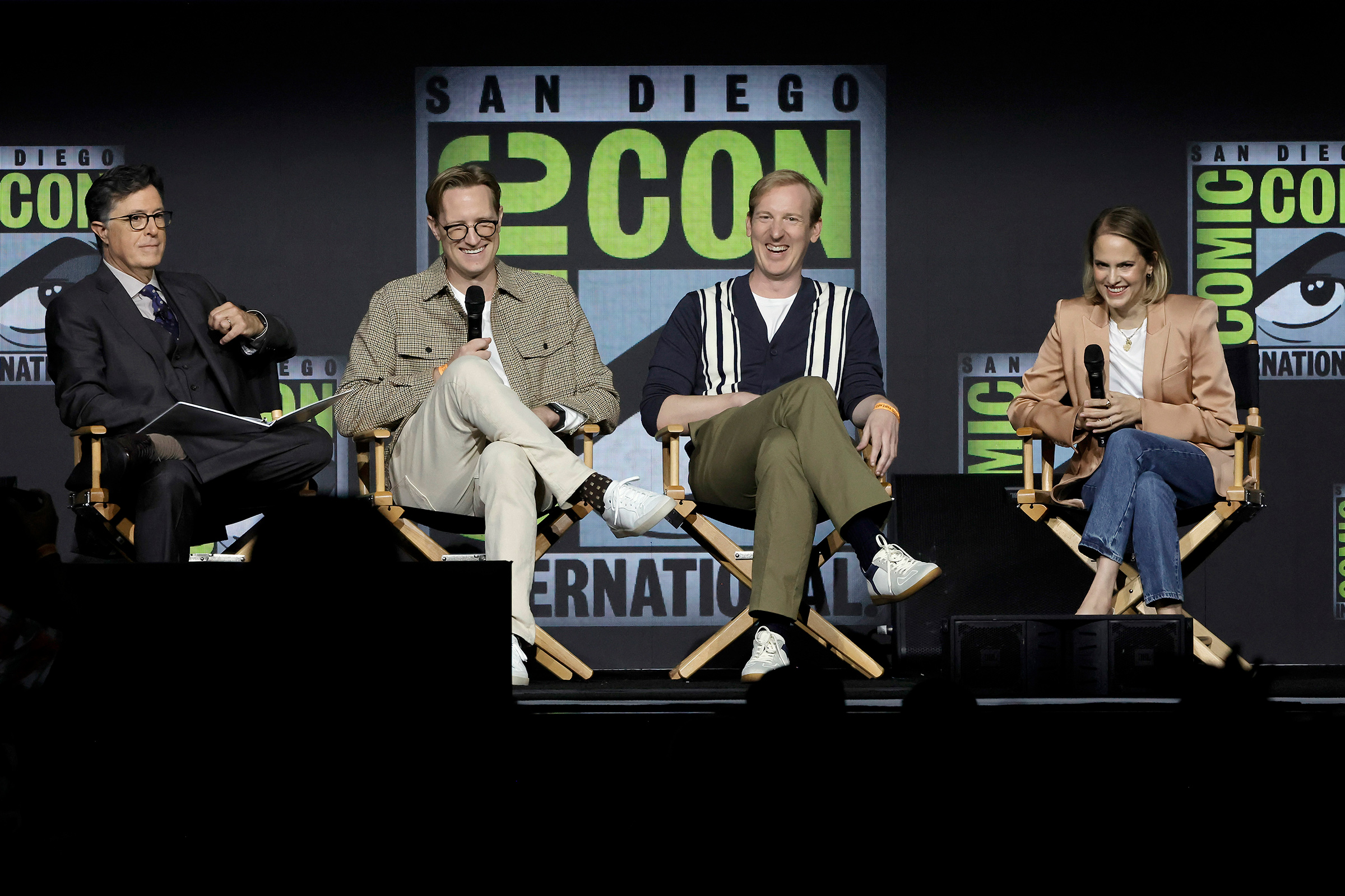 Stephen Colbert with showrunners JD Payne, Patrick McKay and executive producer Lindsey Weber onstage at the "The Lord of the Rings: The Rings of Power" panel during 2022 Comic-Con International: San Diego on July 22, 2022 (Kevin Winter—Getty Images)