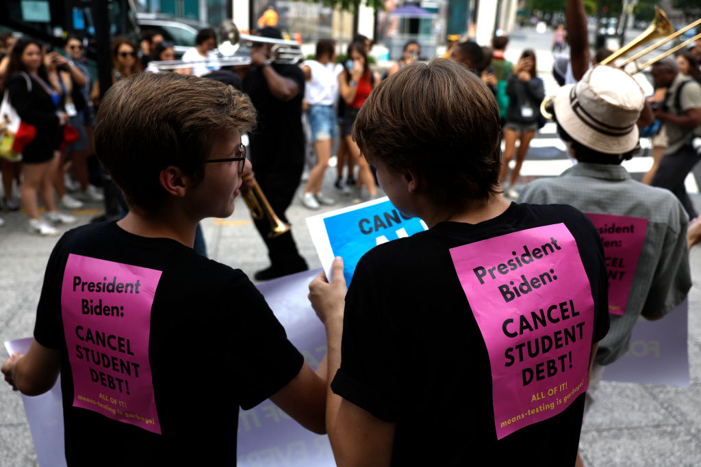 Activists attend a rally outside of the White House to call on U.S. President Joe Biden to cancel student debt in Washington, DC., on July 27, 2022. (Anna Moneymaker—Getty Images))