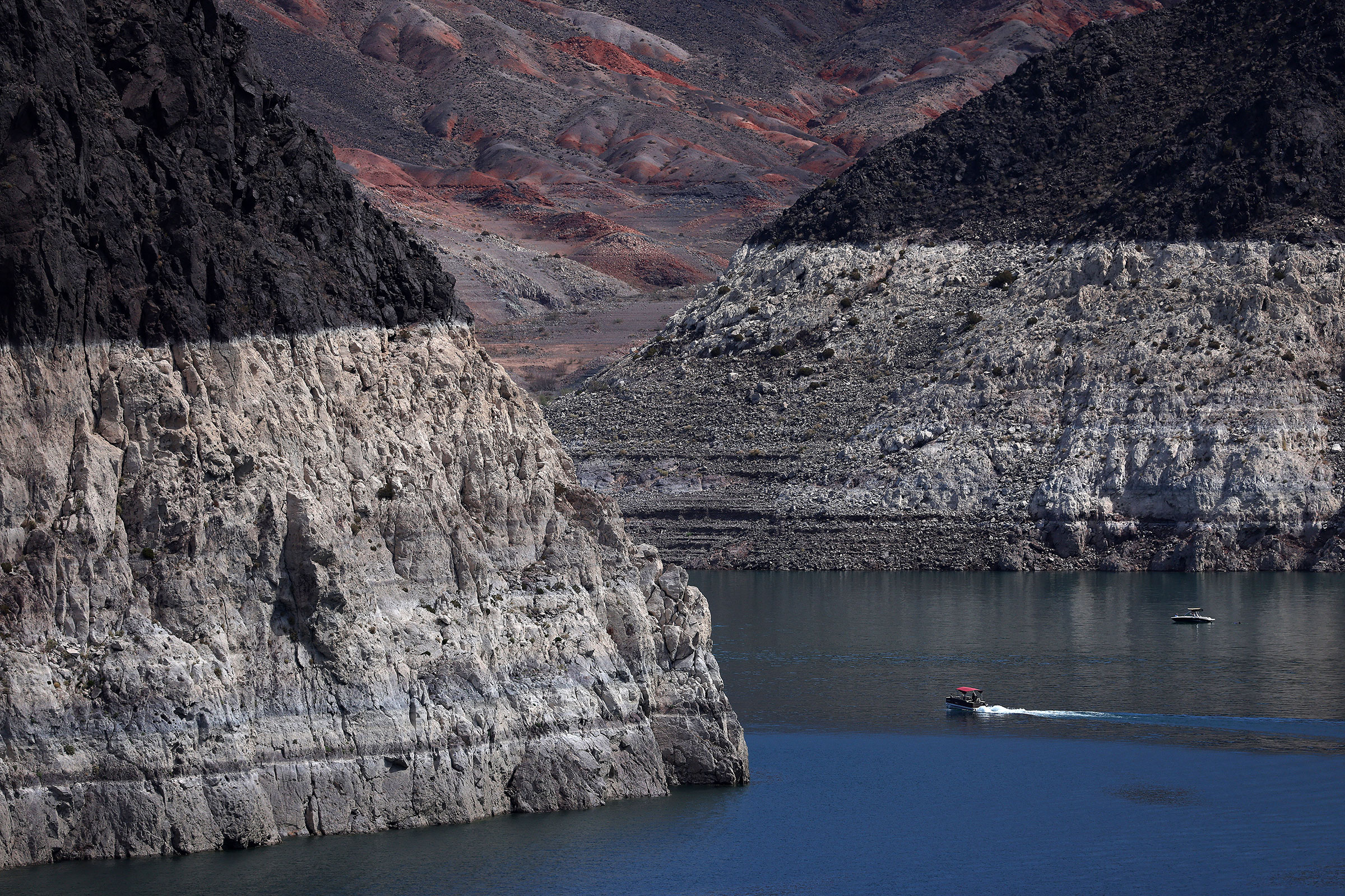 A bleached 'bathtub ring' is visible on the banks of Lake Mead near the Hoover Dam in Lake Mead National Recreation Area,on Aug. 19, 2022. (Justin Sullivan—Getty Images)