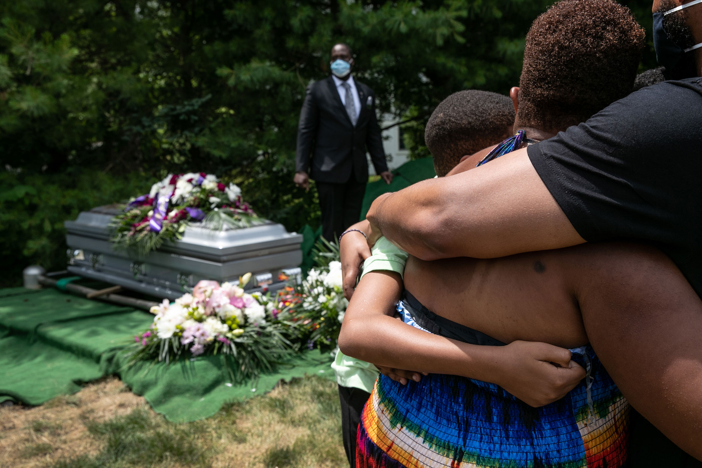 Family members and friends mourn the death of Conrad Coleman Jr. at his burial service in Rye, New York, on July 3, 2020. (John Moore—Getty Images)