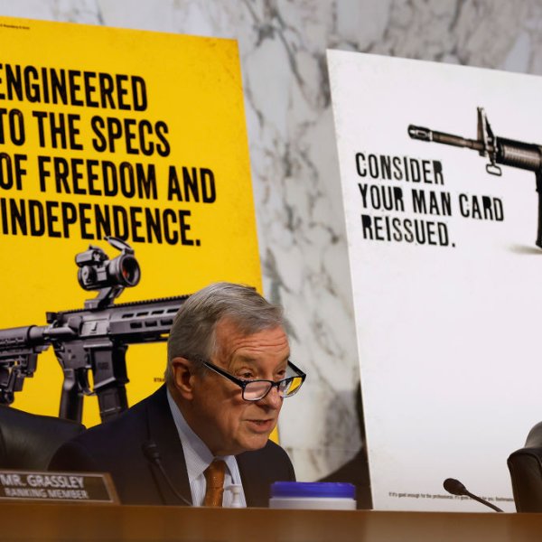 Senate Judiciary Committee Chairman Richard Durbin (D-IL) speaks in front of published advertisements for assault weapons during a hearing about the mass shooting in Highland Park, Illinois, and civilian access to military-style weapons in the Hart Senate Office Building on Capitol Hill on July 20, 2022, in Washington, DC.
