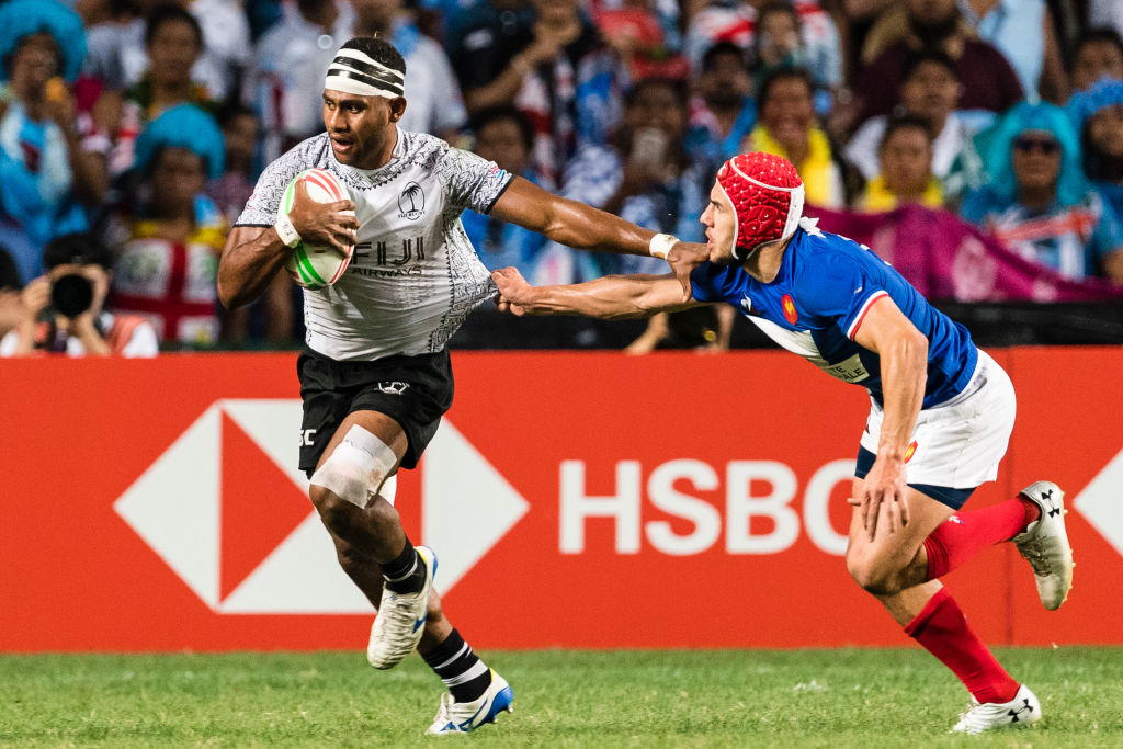 Gabin Villiere of France (R) tries to put a tackle on Vilimoni Derenalagi of Fiji (L) during the day three of the Cathay Pacific/HSBC Hong Kong Sevens Cup Final match between Fiji and France at the Hong Kong Stadium on April 7, 2019 in Hong Kong. (Marcio Machado&mdash;Getty Images)