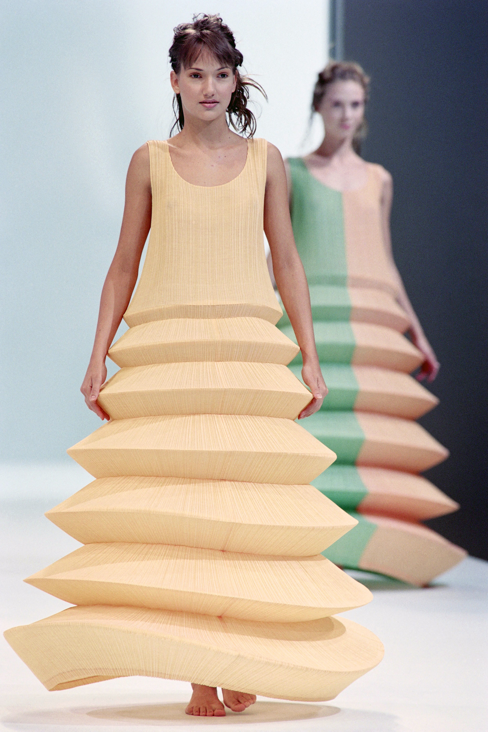 Pleats Please on a Paris runway in November 1994. (Photo by Yoshikazu TSUNO—AFP/Getty Images) (AFP via Getty Images)