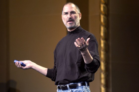 Steve Jobs of Apple Computer celebrates the release of a new Apple iPod family of products at the California Theatre on October 26, 2004 in San Jose California.