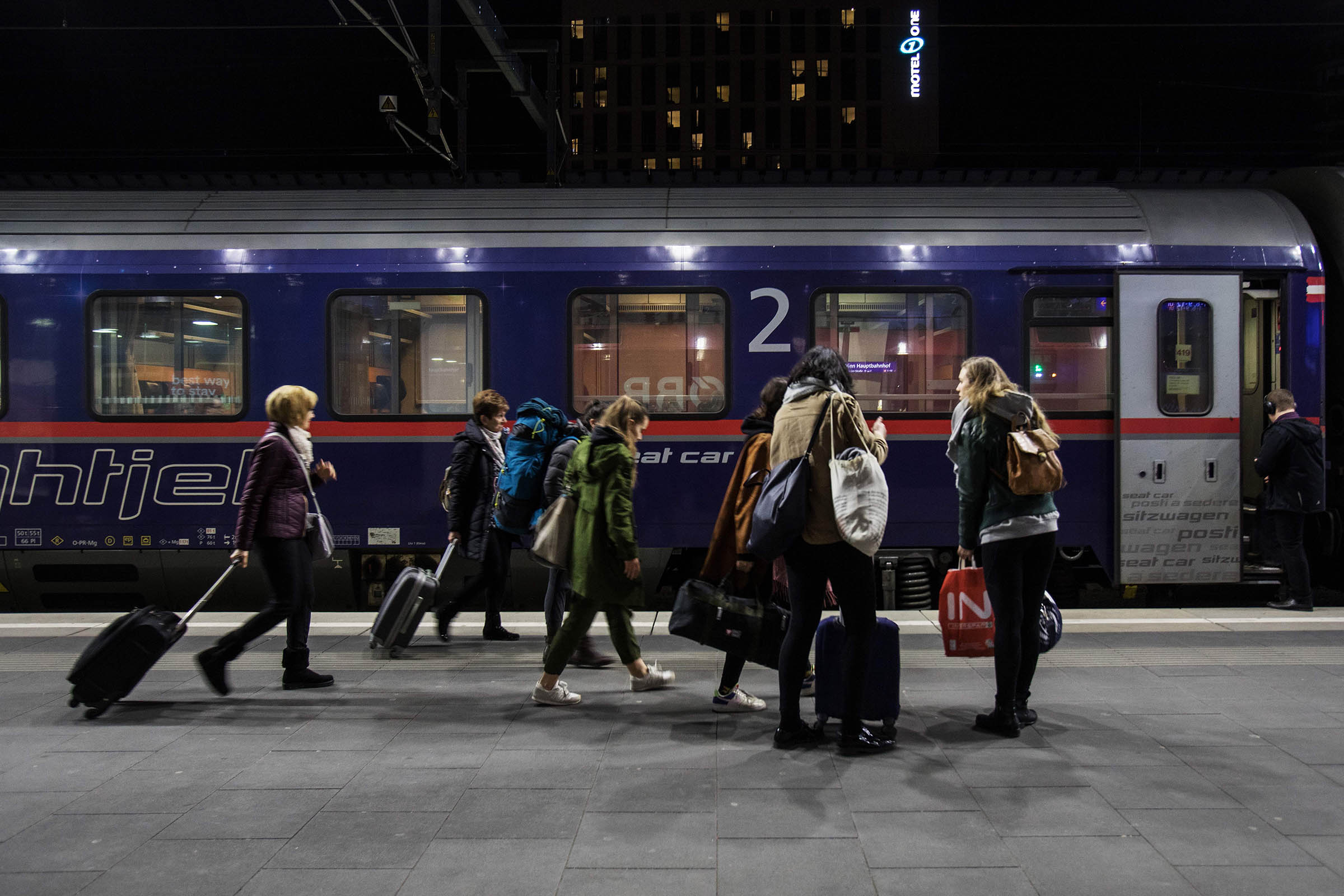 Passengers wait to board a Nightjet train at the Vienna Main Railway Station. (Alex Halada—AFP/Getty Images)