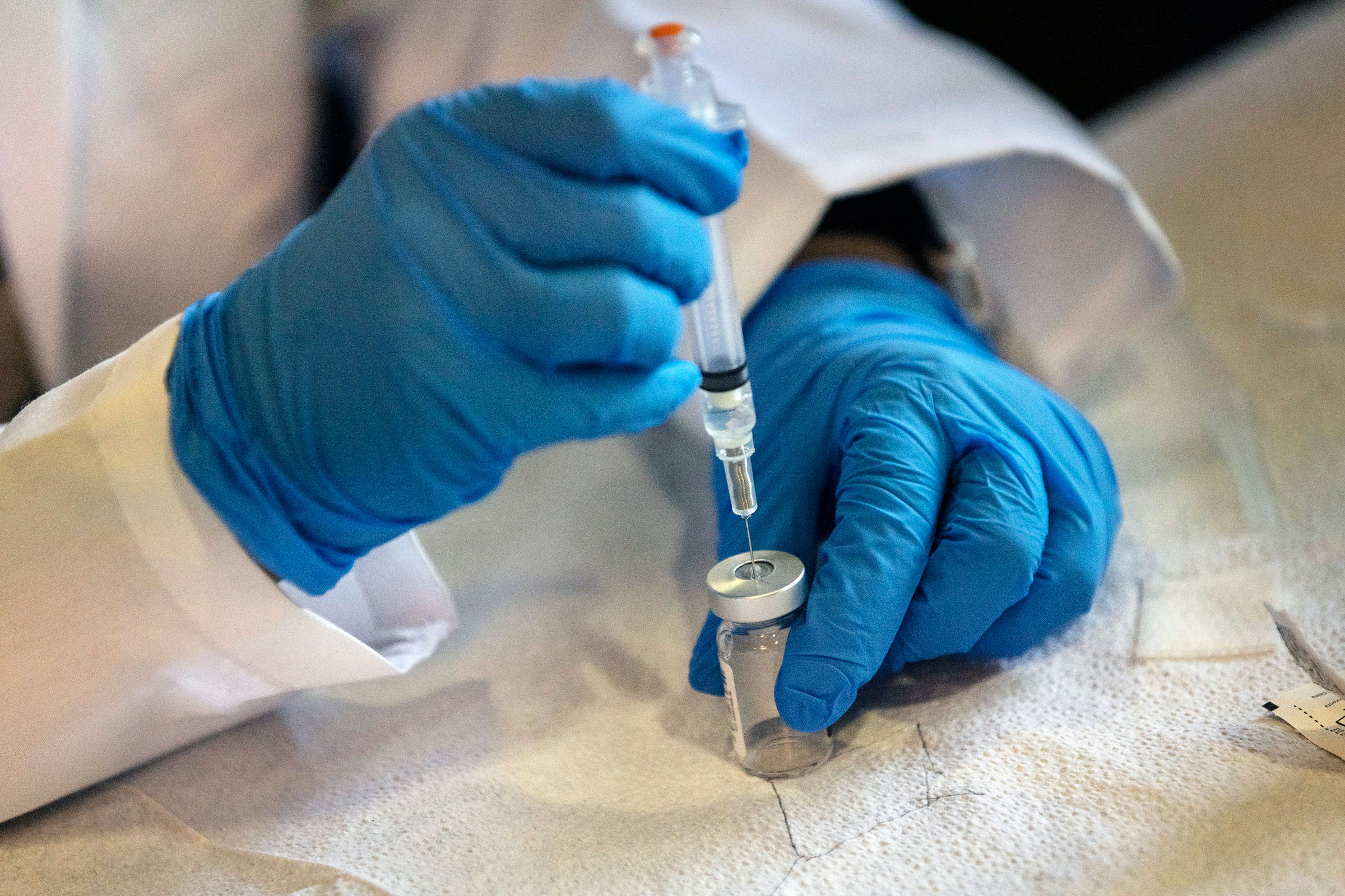 A dose of polio vaccine is prepared on July 22, 2022, at a pop-up vaccination clinic that was opened in Pomona, N.Y., after a polio case was discovered in Rockland County. (Victor J. Blue—The New York Times/Redux)