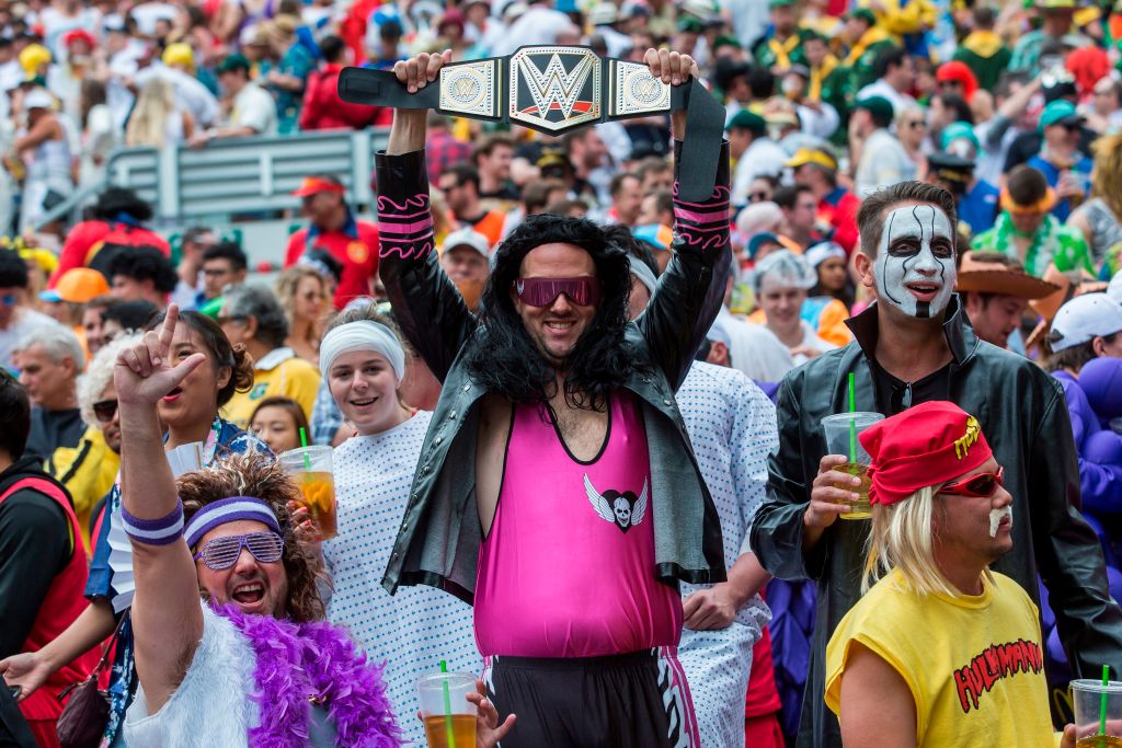 Fans dressed up in costumes pack the South Stand of Hong Kong Stadium early on the second day of the Hong Kong Sevens rugby tournament on April 7, 2018. (Isaac Lawrence—AFP/Getty Images)