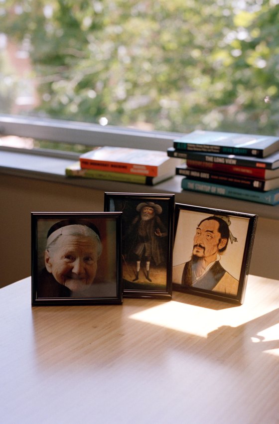 The moral pioneers on MacAskill's desk: humanitarian Irena Sendler, abolitionist Benjamin Lay, and philosopher Mozi
