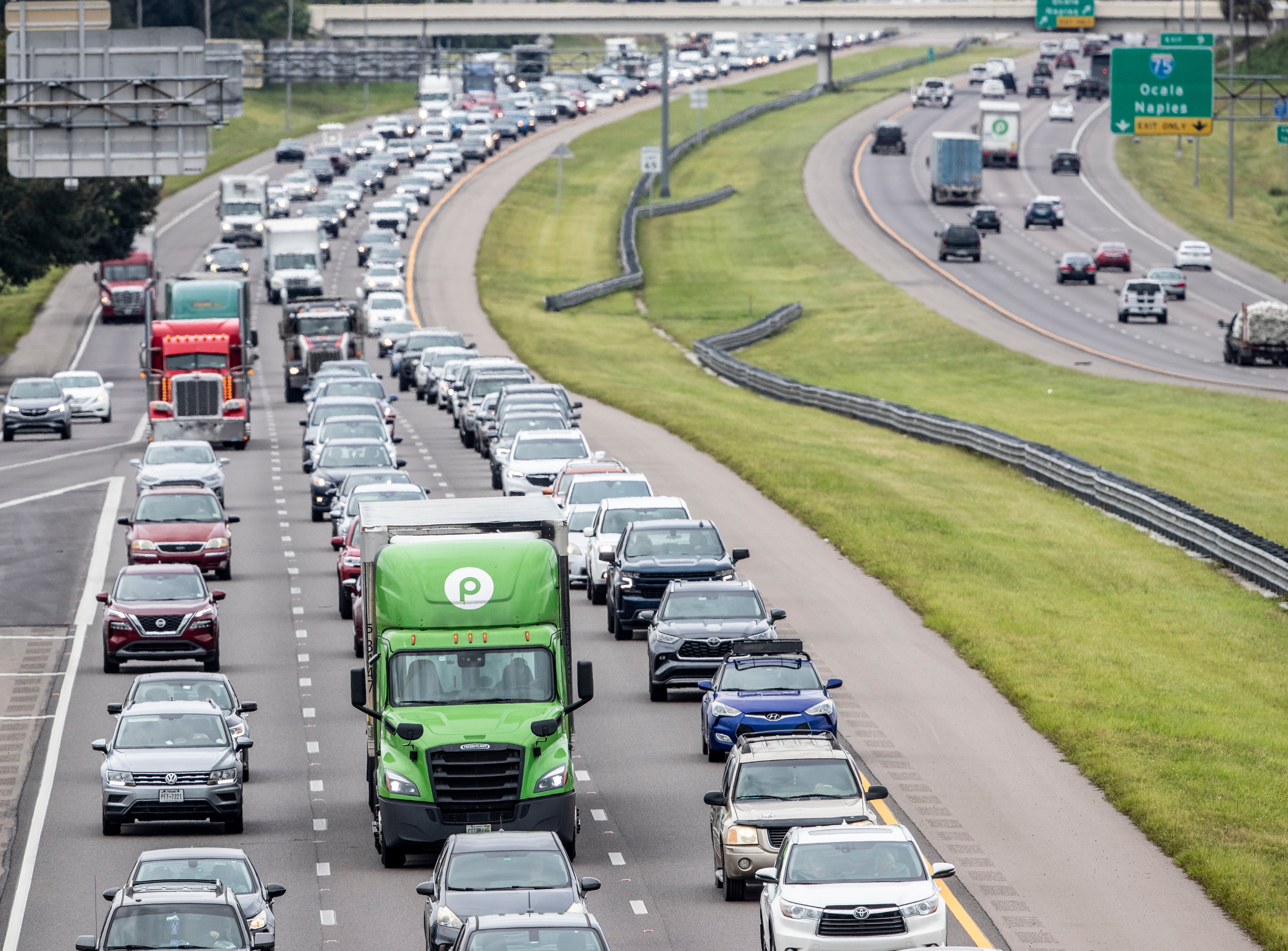 Traffic builds along Interstate 4 in Tampa, Fla., Tuesday, Sept. 27, 2022, as Hurricane Ian approaches. (Willie J. Allen Jr./Orlando Sentinel via AP)