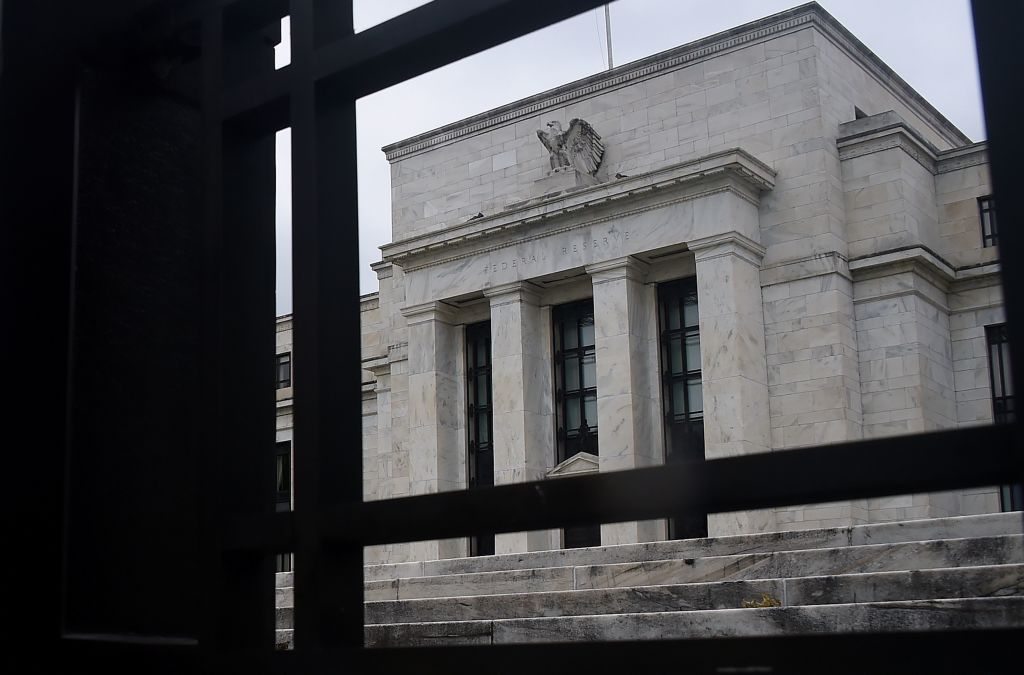 The Federal Reserve Building is seen through a fence on June 17, 2020 in Washington, DC. (Olivier Douliery—AFP/Getty Images)