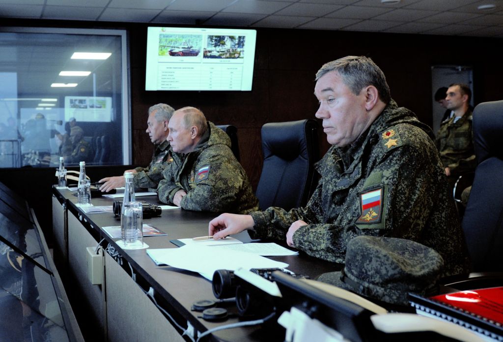 Russian President Vladimir Putin (C), accompanied by Defense Minister Sergei Shoigu (L) and Valery Gerasimov, the chief of the Russian General Staff, oversees the 'Vostok-2022' military exercises at the Sergeevskyi training ground outside the city of Ussuriysk on the Russian Far East on Sept. 6, 2022. (MIKHAIL KLIMENTYEV/SPUTNIK/AFP via Getty Images)
