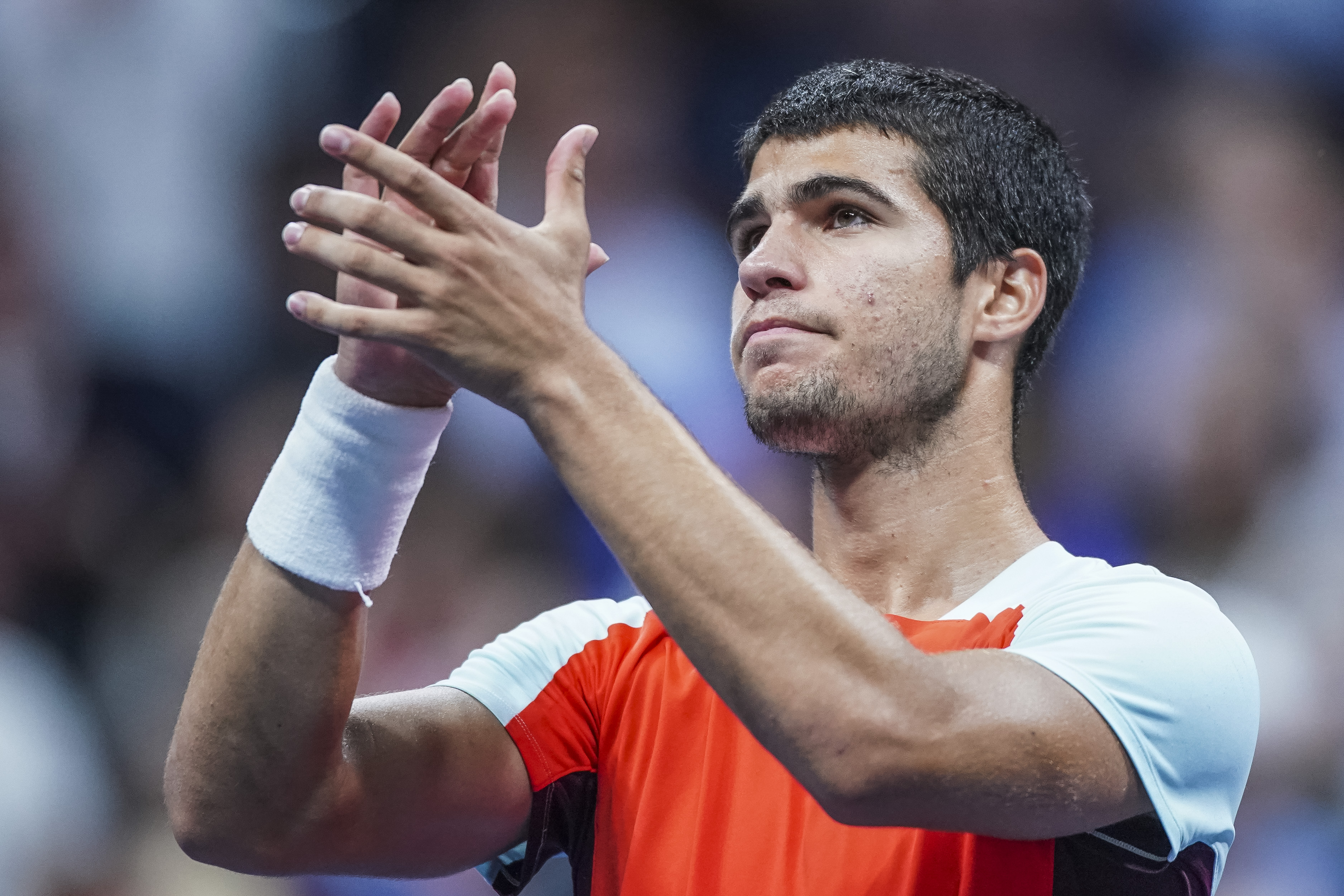 Carlos Alcaraz of Spain reacts after defeating Frances Tiafoe of the United States during their Men's Singles Semifinal match of the 2022 US Open at the USTA Billie Jean King National Tennis Center on September 9, 2022 in  New York City. (Photo by Eduardo MunozAlvarez—VIEWpress)