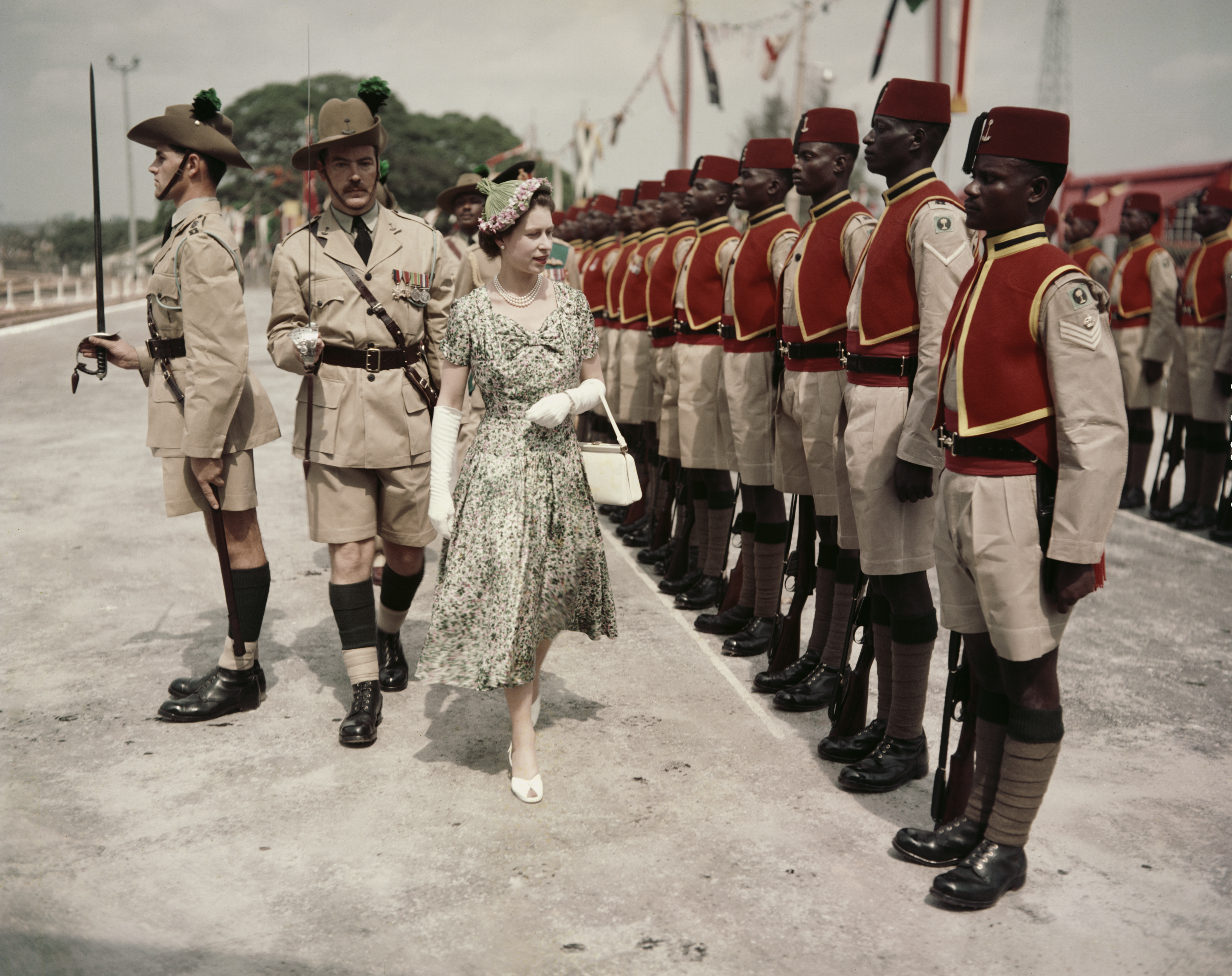 Queen Elizabeth II inspects men of the newly-renamed Queen's Own Nigeria Regiment, Royal West African Frontier Force, at Kaduna Airport, Nigeria, during her Commonwealth Tour, 2nd February 1956. (Photo by Fox Photos/Hulton Archive/Getty Images) (Getty Images&mdash;2012 Getty Images)