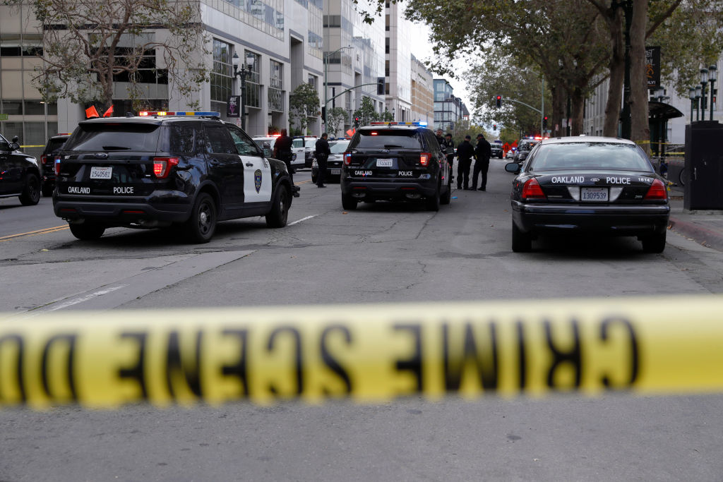 Oakland police investigate a fatal shooting on 14th Street near Broadway in downtown Oakland, Calif., on Tuesday, Sept. 20, 2022. (Jane Tyska—Digital First Media/East Bay Times/Getty Images)