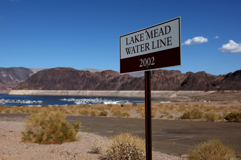 A sign showing where Lake Mead water levels were in 2002 is posted near the Lake Mead Marina in Nevada on Aug. 19. Lake Mead is at its lowest level since being filled in the 1930s following the construction of the Hoover Dam.