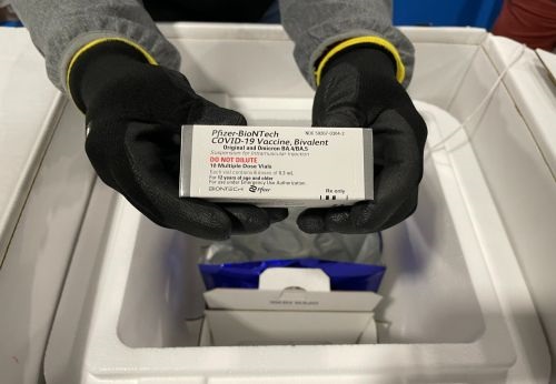 Doses of Pfizer-BioNTech's Omicron bivalent booster vaccine being packed for storage and distribution at Pfizer's facility in Pleasant Prairie, Wis. (Pfizer)