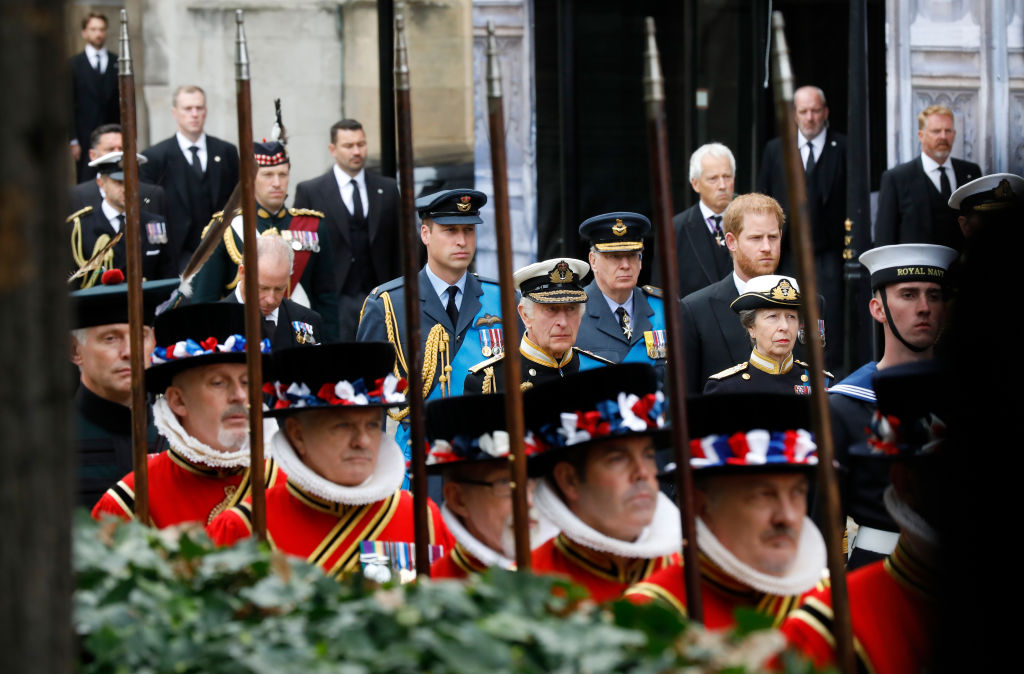 Prince William, Prince of Wales, Prince Richard, Duke of Gloucester, Prince Harry, Duke of Sussex, King Charles III, and Anne, Princess Royal walk alongside Yeoman of the Guards at the State Funeral of Queen Elizabeth II. (Getty Images—2022 Getty Images)
