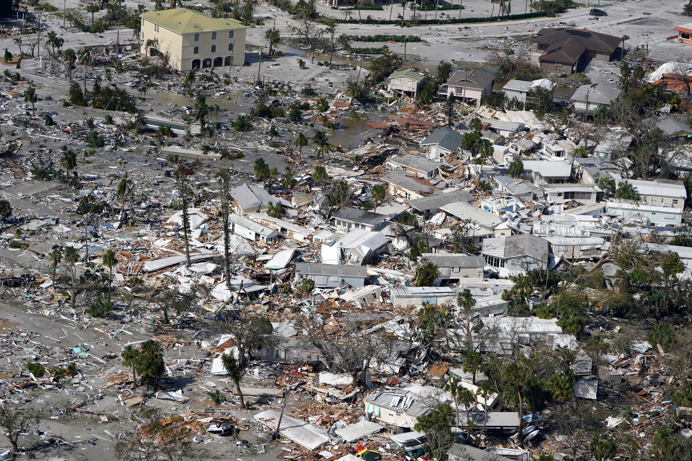 Damaged homes and debris are shown in the aftermath of Hurricane Ian, Sept. 29, 2022, in Fort Myers, Fla. (Wilfredo Lee—AP)