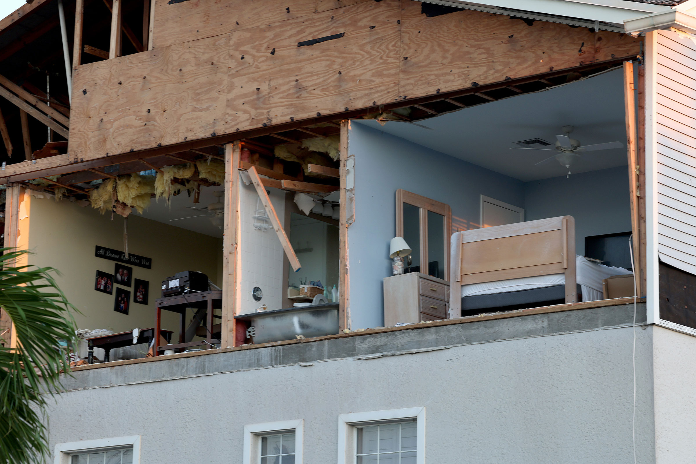 A wall of a condo was torn off as hurricane Ian passed through on Sept. 30 in Fort Myers, Fla. (Joe Raedle—Getty Images)