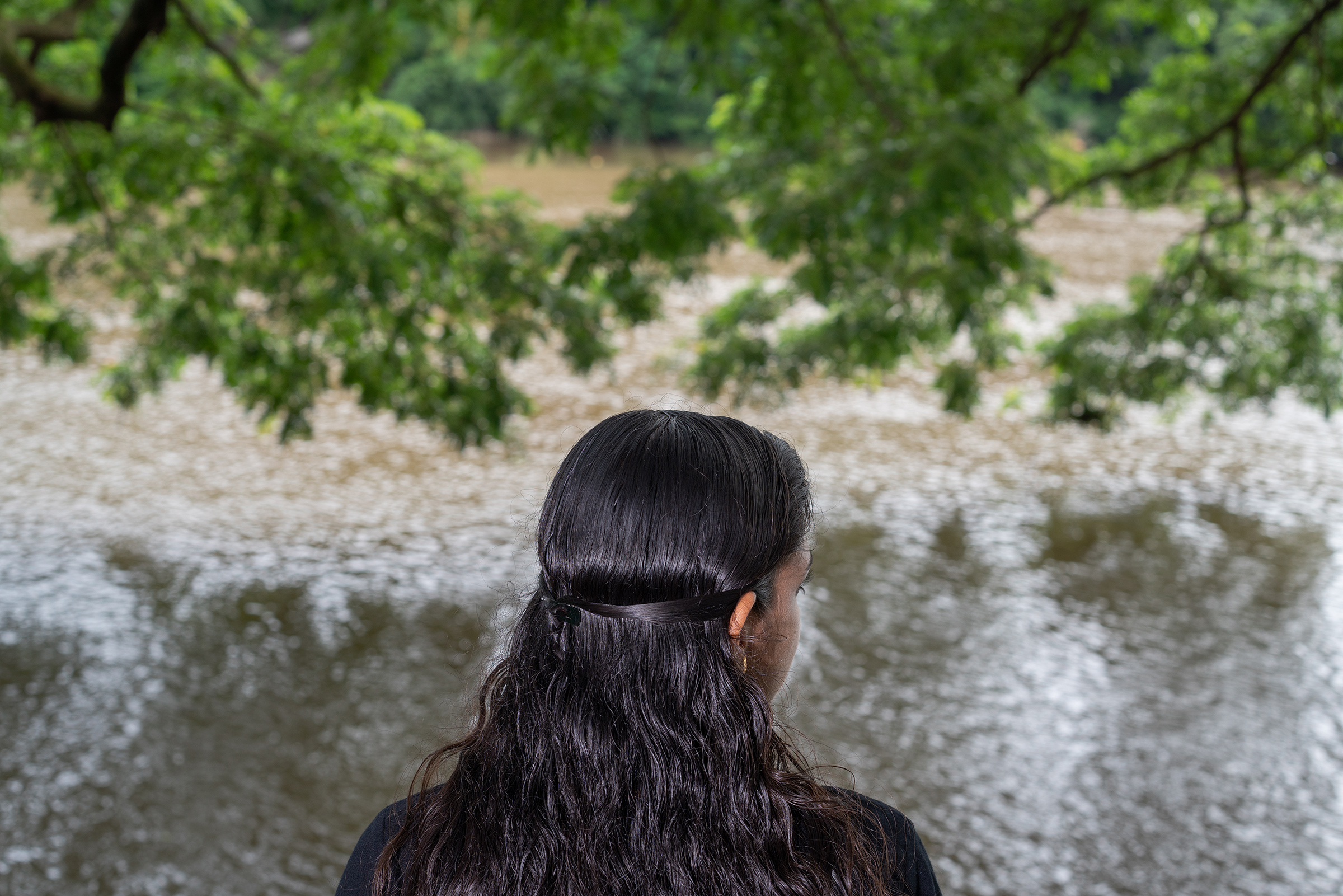 Meenakshi Sajeesh was forced to visit dubious clinics that claim to cure homosexuality after she told her parents she was a lesbian. Sajeesh is pictured overlooking the Periyar River in Aluva town, Kochi, on June 18 (Sameer Raichur for TIME)