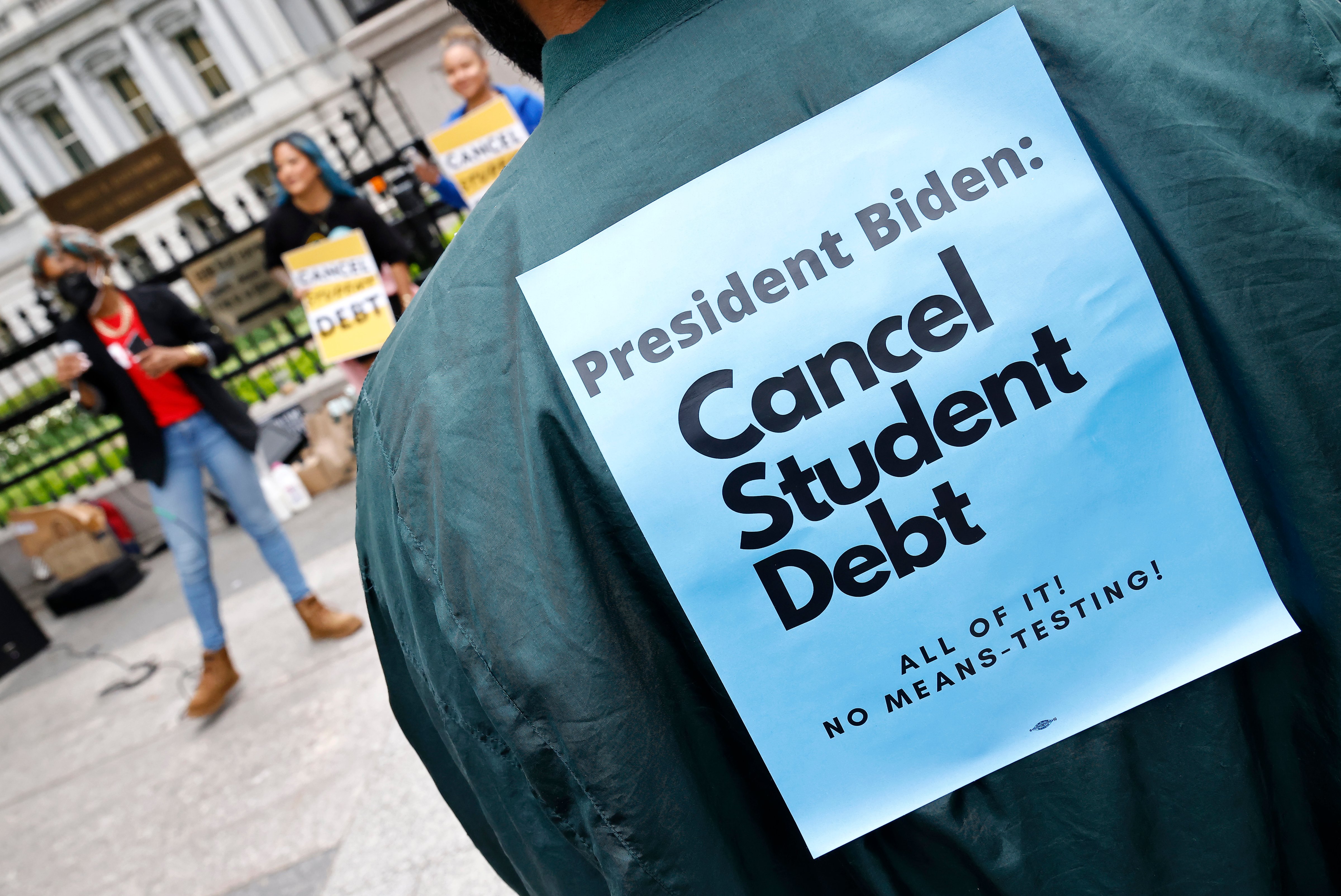 Student loan borrowers gather near the White House to ask President Biden to cancel student debt on May 12, 2022 in Washington, D.C. (Paul Morigi/Getty Images)
