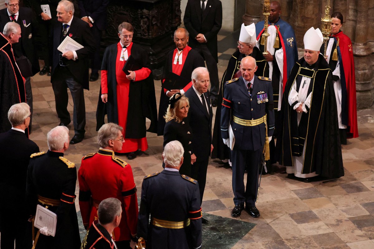 U.S. President Joe Biden and first lady Jill Biden arrive to take their seats inside Westminster Abbey in London on September 19, 2022, for the State Funeral Service for Britain's Queen Elizabeth II.
