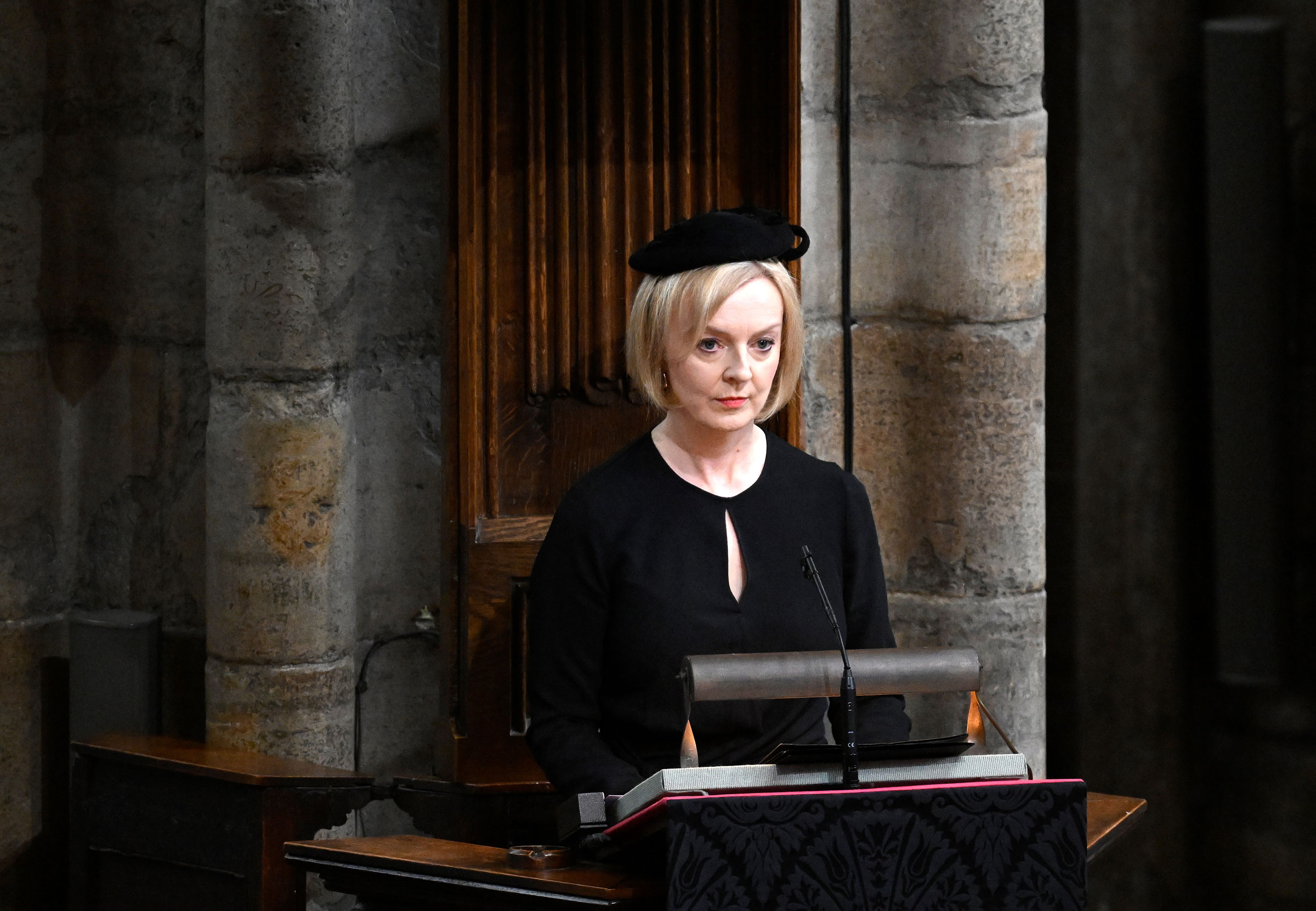 UK Prime Minister Liz Truss delivers a reading during the state funeral of Queen Elizabeth II at Westminster Abbey on September 19, 2022 in London.  (Gareth Cattermole—Getty Images)